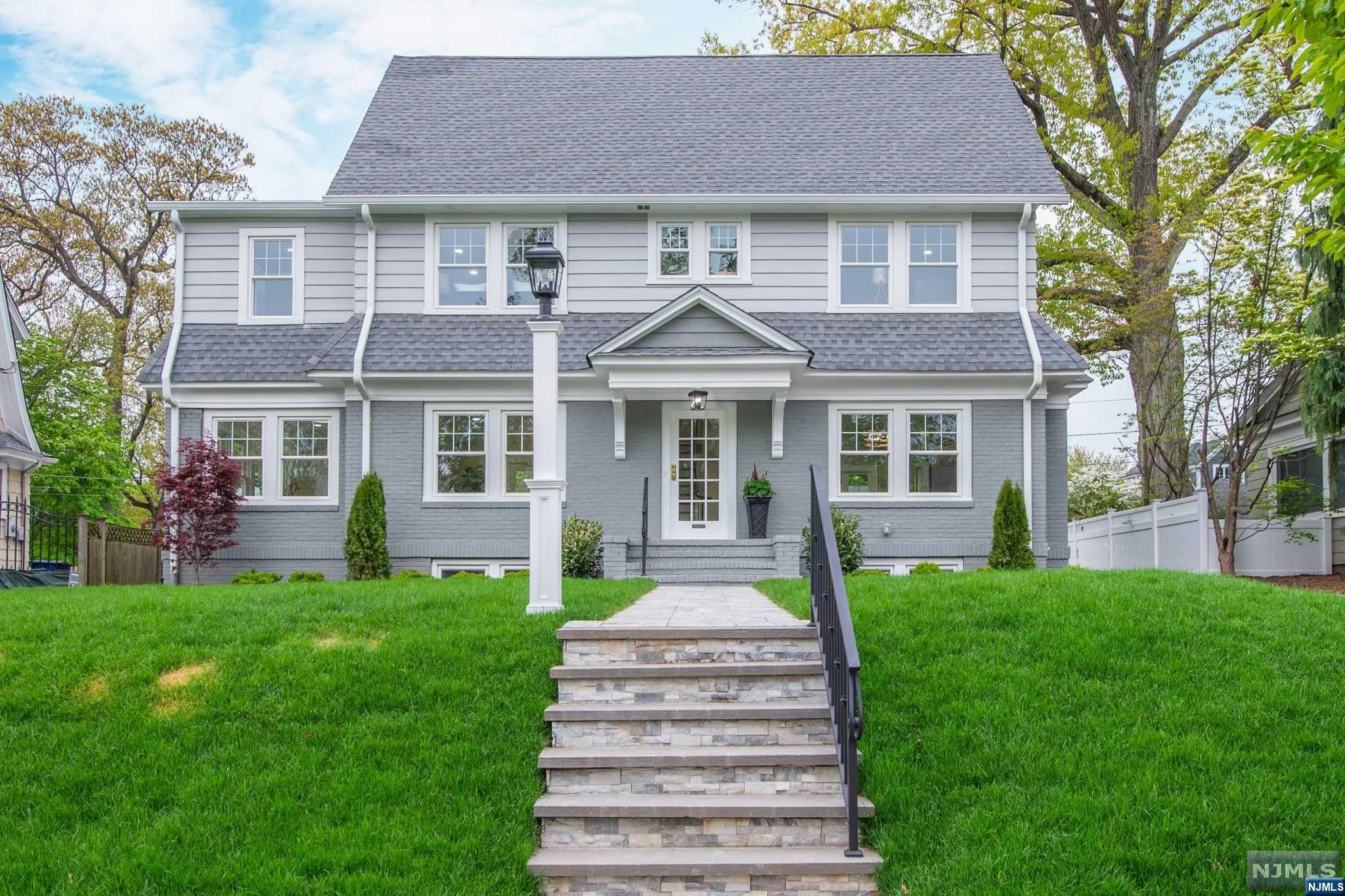 Classic, Elegant with a twist of Modern best describes this meticulously renovated Colonial on one of Montclair's most desirable streets. The light filled "Open Concept "main floor, seamlessly blends sophisticated updates with traditional details. The Living Rm with perfectly placed French Doors offers views of the expansive yard, while the generously sized Dining Rm & oversized Breakfast Bar invites you to relax & enjoy a meal with friends. The custom kitchen, features high end appliances, farm sink, ambient lighting, room to spread out, is every chefs envy. The 2nd fl primary, is truly a work of art, with 2 large walk in closets, a beautifully appointed bath, views of yard, soaking tub & walk in shower, it is your Zen retreat. The 3d fl ensuite with full bath & office/den, adds another private living, work & play space. The oversized family rm features wet bar, wine fridge, open space & half bath. While the lovely patio has you planning your next BBQ, garden party or summer nap!