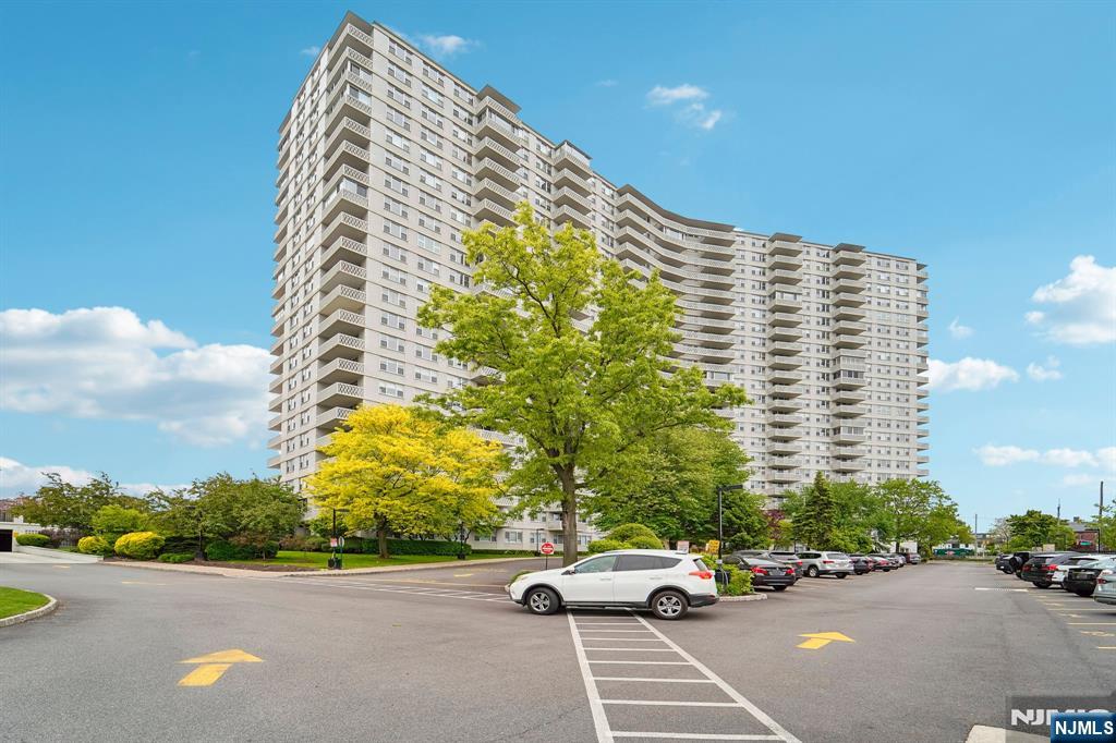 Welcome home to this bright and beautifully updated east-facing 1-bedroom condominium located on a desirable low floor in the full-service Mediterranean South community. Offering modern updates, exceptional amenities, and low-maintenance living, this inviting residence is perfectly suited for comfortable everyday living and effortless commuting. Step into the welcoming entry foyer with a bonus coat closet for convenient additional storage. The foyer opens into the sunlit living area where oversized windows overlook the community's outdoor amenities and fill the space with beautiful natural light, creating a warm and airy atmosphere. Crown molding and luxury vinyl tile flooring extend throughout the home, adding style and continuity. The redesigned kitchen offers ample cabinetry, extra pantry storage, and a functional layout. The spacious bedroom features a large walk-in closet, while two additional hallway closets provide excellent storage space. The tastefully renovated bathroom showcases tasteful modern finishes and clean design. Residents enjoy 24/7 concierge and doorman service, on-site management and maintenance, community room, pools, athletic courts, playground, fitness center, on-floor laundry, and assigned parking available after closing. Conveniently located near shopping, restaurants, houses of worship, NJ Transit, the GWB, and the free Columbia employee shuttle, this home offers exceptional comfort, convenience, and value with low monthly HOA fees.
