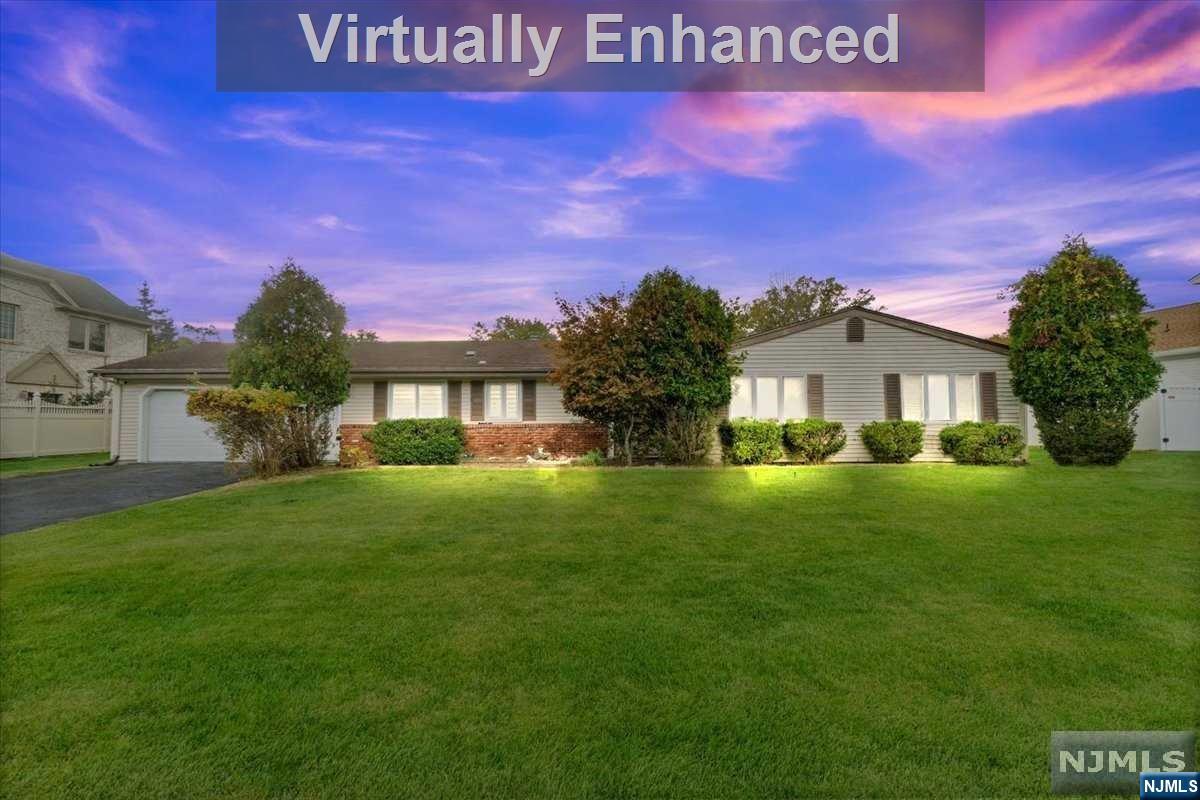 Sprawling 5-bedroom, 2-bath ranch, underwent a comprehensive renovation in 2015. This meticulously upgraded residence offers a plethora of contemporary amenities to enhance your daily life. Inside, the home has been thoughtfully equipped with cutting-edge CAT6 wiring, delivering swift and dependable connectivity throughout the house. Recessed lighting accents the rooms, ensuring well-lit and inviting living spaces, day or night. One of the home's standout features is the introduction of a new Uponor Pex A system. This state-of-the-art heating system provides consistent warmth, adding a layer of comfort that extends beyond aesthetics. The new central air system complements the Pex A. The kitchen boasts 2023 stainless steel appliances. 8-person hot tub and a 2020 paver patio invite outdoor relaxation complemented by "Invisible Fence" for your pet. Crown molding, closet organizers, wood burning stove... too much to list!