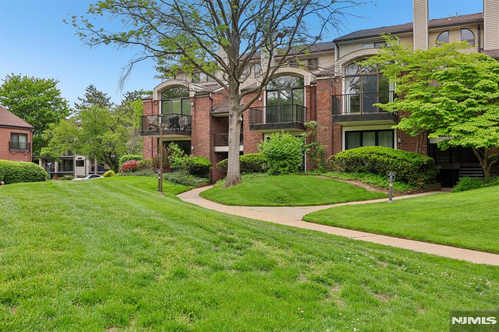 Discover effortless one-floor living at desirable Glenpointe! This beautifully maintained two-bedroom, two-bath condo offers the perfect blend of comfort, space, and convenience. From the moment you enter, youâ€™ll appreciate the bright, open layout and inviting atmosphere. The sunken living room serves as the heart of the home, featuring a cozy fireplace, custom built-in cabinetry, and sliding glass doors leading to a private patio â€” perfect for relaxing or entertaining. The spacious dining area flows seamlessly into the oversized eat-in kitchen, complete with abundant cabinetry, generous counter space, and room for casual dining. Down the hall, youâ€™ll find an in-unit laundry area, a well-sized secondary bedroom, and a full bath. The expansive primary suite is a true retreat, offering two large closets and a luxurious ensuite bath with dual vanities, a soaking tub, and separate stall shower. Additional highlights include a one-car garage, ample parking, and access to Glenpointeâ€™s outstanding amenities, including a pool, tennis courts, dog run, and plenty of guest parking. Ideally located near major highways, shopping, dining, and everyday conveniences, with NYC bus service right outside the gate for an easy commute. This is the lifestyle opportunity youâ€™ve been waiting for! Call Cherilyn at 862-224-9632.