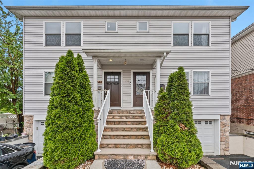 Experience modern living in this fully renovated side townhouse/duplex located in the highly desirable town of Garfield. The owner has meticulously maintained the home, keeping it in pristine condition. Step into a stunning and fully renovated oversized kitchen that truly must be seen to be appreciated, featuring quartz countertops and sleek white cabinetry. Beautiful new hardwood floors run throughout the home. The ground level boasts a spacious bonus area, ideal for entertaining or a second living space, along with a convenient laundry area. The main floor offers a bright and open layout with a living room, dining area, and a gorgeous kitchen, as well as a half bath for guests. Upstairs, you'll find three comfortable bedrooms, including a spacious primary suite with its own private bathroom. Enjoy the convenience of a private backyard and dedicated parking with a garage. This property is centrally located near public transportation, parks, shops, schools, and more, making it an ideal place to call home.