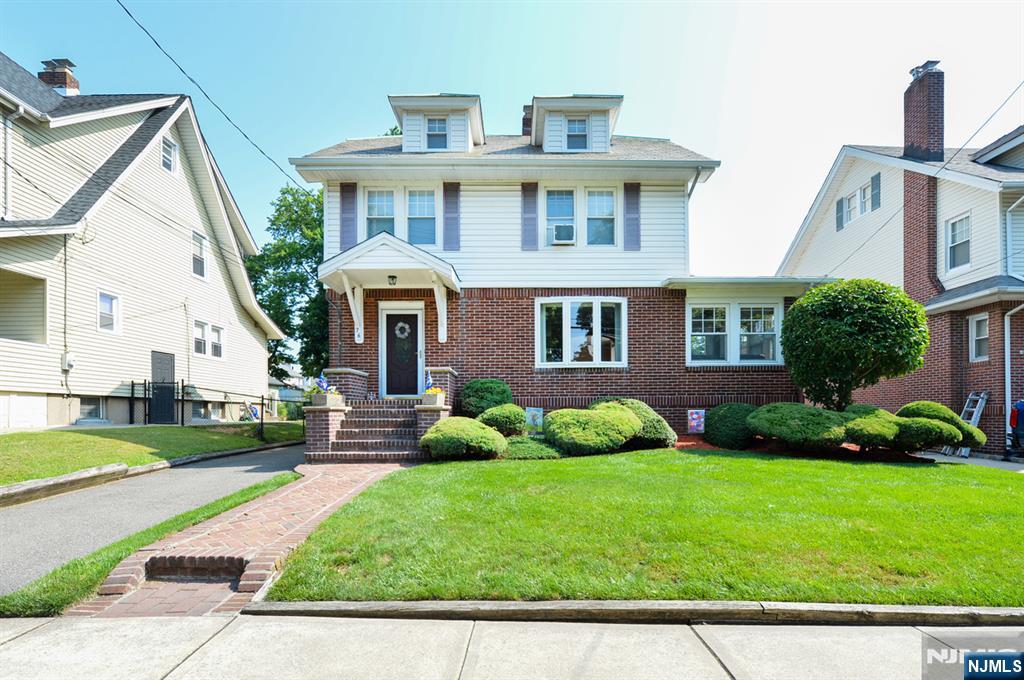 Ridgefield Park buyersâ€”your search may be over! Nestled on picturesque Poplar Street, this timeless brick Colonial combines classic charm with an unbeatable location. Whether you're drawn to its tree-lined setting, spacious sun-filled rooms, or the vibrant sense of community, this is a home you'll be proud to call your own. Perfectly situated just steps from the beloved Baby Parade route and Main Parade staging areas, you'll have a front-row seat to two of Ridgefield Park's favorite traditions. Commuters will appreciate the easy access to both the Main Street and Teaneck Road express bus routes to Manhattan, while downtown shops, restaurants, parks, and schools are all just a short distance away. Inside, generous living spaces are filled with natural light, creating a warm and welcoming atmosphere for everyday living and entertaining alike. Spend those last warm, September evenings grilling and gathering on the deck, then look forward to crisp autumn days and cozy winter nights curled up by the fireplace. This is more than a houseâ€”it's a home that offers timeless character, everyday convenience, and the opportunity to become part of one of Ridgefield Park's most cherished neighborhoods.