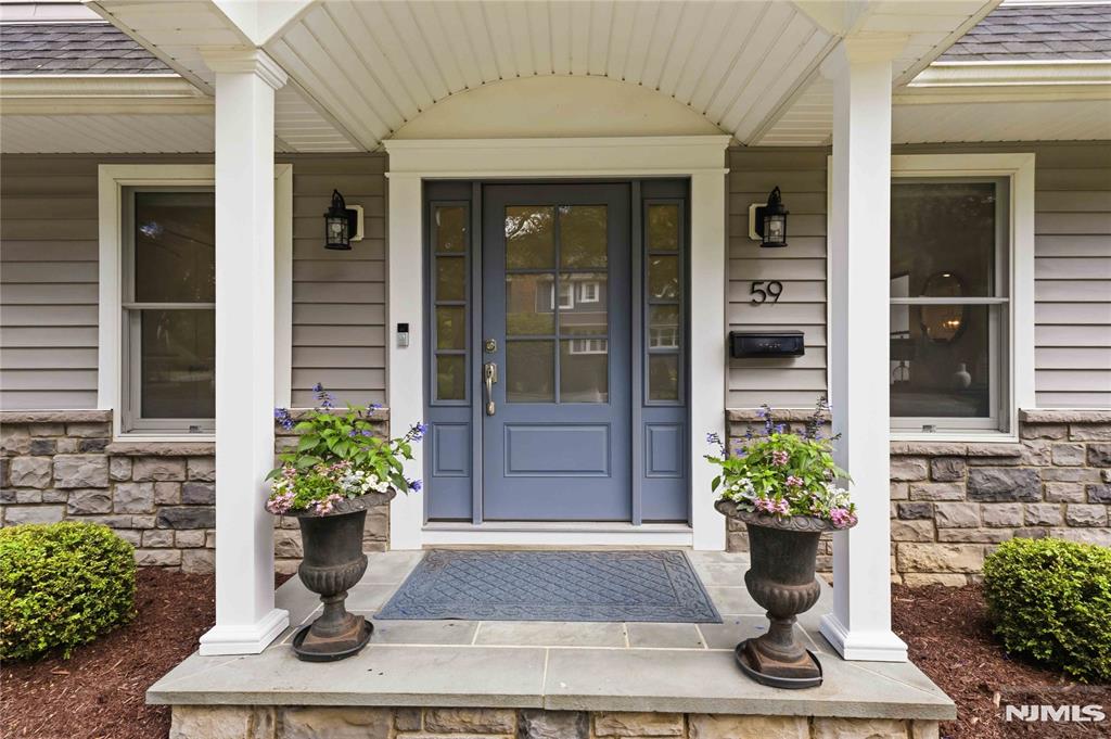 Welcome home! Step through the elegant entryway of this stunning colonial to experience the airy, open floorplan. Beautifully designed for modern comfort, this entire home was newly built only 5 years ago. The sun soaked interior delights with its spacious living room, formal dining room and gorgeous white kitchen. The gourmet kitchen features stainless steel appliances, a Bertazzoni stove, quartz countertops and a generous center island with seating. The charming breakfast area overlooks the pretty paver patio and lush green yard, perfect for summer entertaining. Upstairs you will find an inviting primary suite with a walk-in closet and porcelain tiled bath. Three more sunny, large bedrooms with huge closets complete the second floor. One bedroom is currently being used as a home office/gym. The fully finished lower level features a full bathroom, recreation room, workout area, laundry and storage. Located in a lovely neighborhood - close to everything - town, restaurants, shops and TWO train lines to NYC. A commuterâ€™s dream! Come live in wonderful Glen Rock with its top-rated schools, welcoming community and the BEST town pool - just in time for summer!