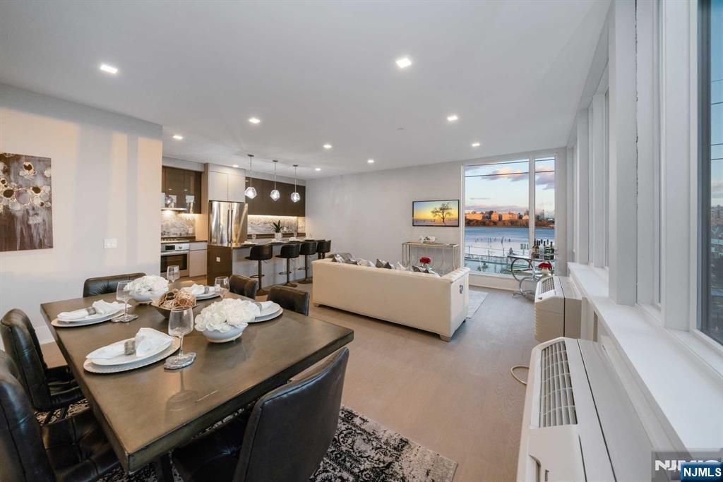 Spacious 2 bed 3 bath duplex unit, in stunning, ultra-luxury rental building on River Road in North Bergen. Absolutely gorgeous finishes and features with tons of amenities. Amazing Pool & Pool Deck with fire pit and grills with unobstructed NYC views. On-site gym, doorman, and garage parking available. State of the art kitchens boast Bosch appliances, sleek European-style cabinetry, under-cabinet lighting, waterfall quartz countertops, and center islands. Bathrooms offer imported porcelain tiles, Grohe trim package, and floating vanities. 7-inch hardwood flooring throughout. Laundry in unit. Storage available. Amazing location so close to transportation into NYC... Ferry & Bus! Close proximity to fabulous restaurants, shopping, Hoboken, and more. Pet may be considered. Credit Check & Proof of income required.
