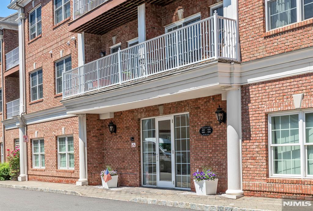Top Floor, End Unit is one of only a few 3 bedrooms in the Desirable Paris Square Community! Condo is in Excellent Condition w/ abundant sunshine & many updates! Simply unbag your bags & enjoy all the 50+ Paris Square, Active Lifestyle, Full Amenity Community has to offer. Gorgeous open design is showcased as you step into your spacious foyer w/ pantry & coat closet. Large gourmet MEIK has oversized peninsula, SS appliances including both refrigerator, wine cooler & upgraded hood. Lovely dining area opens to balcony & living room. New, modern recessed lighting & light fixtures, hardwood flooring & freshly painted completes the picture perfect design. Washer / Dryer & water Heater updated in 2025. 3 bedrooms, including an oversized primary suite w/ huge WIC finished by California Closets & primary bath w/ separate whirlpool tub, separate shower & double vanity. A 2nd full bath completes this spacious layout along w/ Laundry in the unit. 2 indoor parking spaces AND 2 indoor storage units are all assigned to this condo & the building provides an elevator from the parking level to the top floor, 3rd level. Beautiful detailing & great closet space! Amenities include clubhouse w/ fireplace, kitchen, gym, theater, billiards, pool, community garden, putting green & walk path thru 64,170 sf of landscaped park! HOA includes onsite super, water & flood insurance along w/ landscaping, snow removal & amenities. Monthly reserve fund contribution of $172 for balance of 2026.