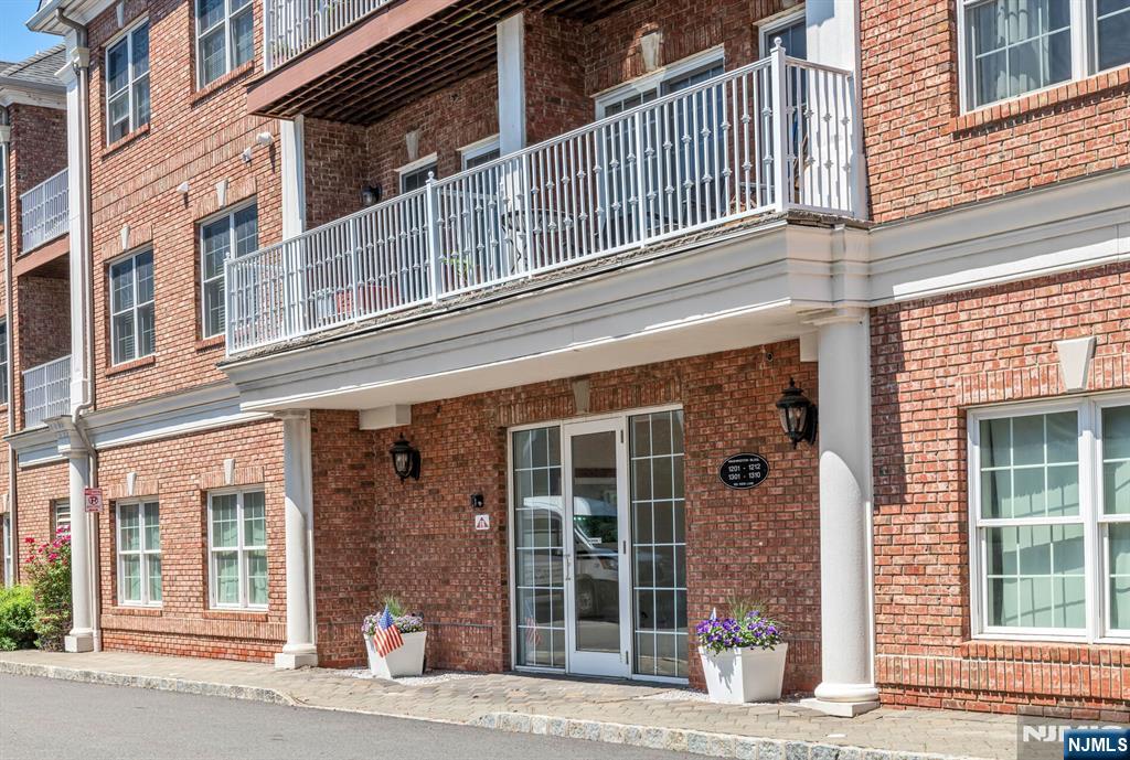Top Floor, End Unit is one of only a few 3 bedrooms in the Desirable Paris Square Community! Condo is in Excellent Condition w/ abundant sunshine & many updates! Simply unbag your bags & enjoy all the 50+ Paris Square, Active Lifestyle, Full Amenity Community has to offer. Gorgeous open design is showcased as you step into your spacious foyer w/ pantry & coat closet. Large gourmet MEIK has oversized peninsula, SS appliances including both refrigerator, wine cooler & upgraded hood. Lovely dining area opens to balcony & living room. New, modern recessed lighting & light fixtures, hardwood flooring & freshly painted completes the picture perfect design. Washer / Dryer & water Heater updated in 2025. 3 bedrooms, including an oversized primary suite w/ huge WIC finished by California Closets & primary bath w/ separate whirlpool tub, separate shower & double vanity. A 2nd full bath completes this spacious layout along w/ Laundry in the unit. 2 indoor parking spaces AND 2 indoor storage units are all assigned to this condo & the building provides an elevator from the parking level to the top floor, 3rd level. Beautiful detailing & great closet space! Amenities include clubhouse w/ fireplace, kitchen, gym, theater, billiards, pool, community garden, putting green & walk path thru 64,170 sf of landscaped park! HOA includes onsite super, water & flood insurance along w/ landscaping, snow removal & amenities. Monthly reserve fund contribution of $172 for balance of 2026.