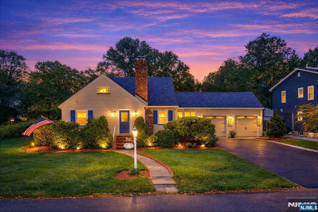 Oversized Cape Cod situated on a beautifully maintained lot in one of Hillsdale's most desirable neighborhoods. This well-maintained home offers a spacious and versatile layout featuring a bright living room, formal dining room, updated kitchen, two first-floor bedrooms, a den, and a full bathroom. The second level is dedicated to a private primary suite complete with its own full bath, creating a peaceful retreat. The fully finished basement provides exceptional additional living space, ideal for a recreation room, home office, gym, or media area. A rare bonus is the attached two-car garage, which is both heated and air-conditioned, offering year-round comfort and flexibility. The oversized driveway accommodates up to four vehicles, while the beautifully landscaped property and private backyard provide the perfect setting for outdoor enjoyment. Ideally located close to parks, schools, shopping, and transportation, this exceptional home offers comfort, versatility, and convenience in a prime Hillsdale location.