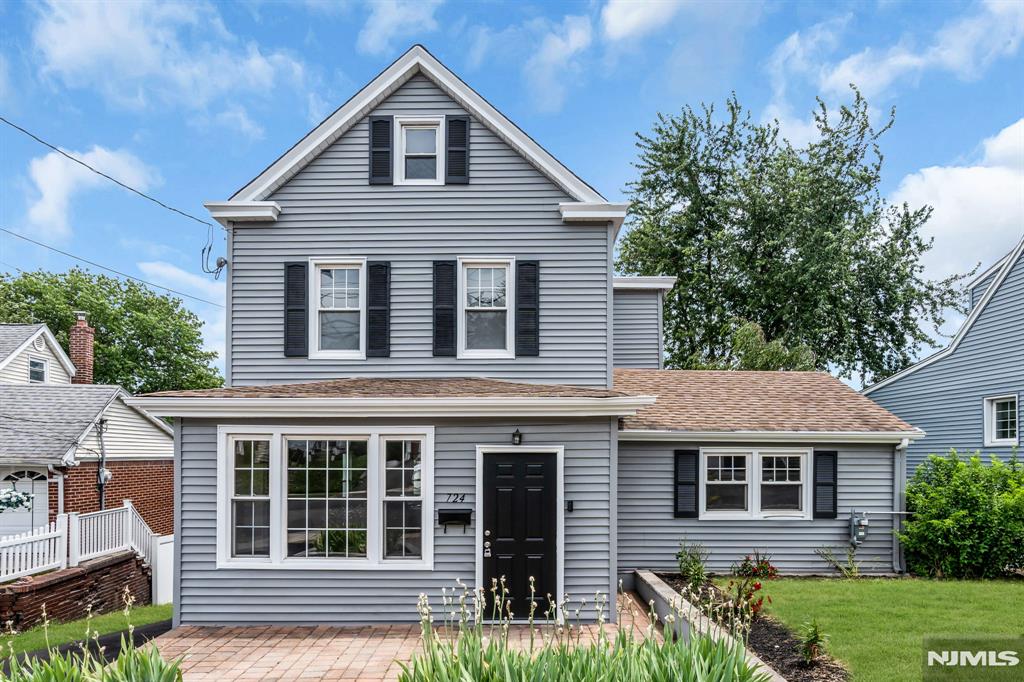 This beautifully renovated Colonial offers 3 bedrooms and 2 full baths, combining modern finishes with comfortable living and a seamless indoor-outdoor lifestyle. Step inside to a brand-new kitchen featuring white shaker cabinetry, quartz countertops, and stainless-steel appliances. The home is finished in a clean white palette throughout, accented with bold black details for a timeless, modern look. Enjoy year-round comfort with a new, two-zone HVAC system and durable luxury vinyl plank flooring throughout. The partially finished basement provides additional flexible space and includes direct access to the outdoors ideal for a home office, gym, or recreation area. The home has been freshly painted and updated with new lighting and interior doors, making it truly move-in ready. Outside, unwind in your own private setting with a spacious deck and stunning views of the New York City skyline perfect for entertaining or relaxing on summer evenings. The property also features a new driveway and 2-car detached garage for added convenience. Located in the desirable Lyndhurst area, this home is close to parks, shopping, and major transportation options. 1 year home warranty is included.