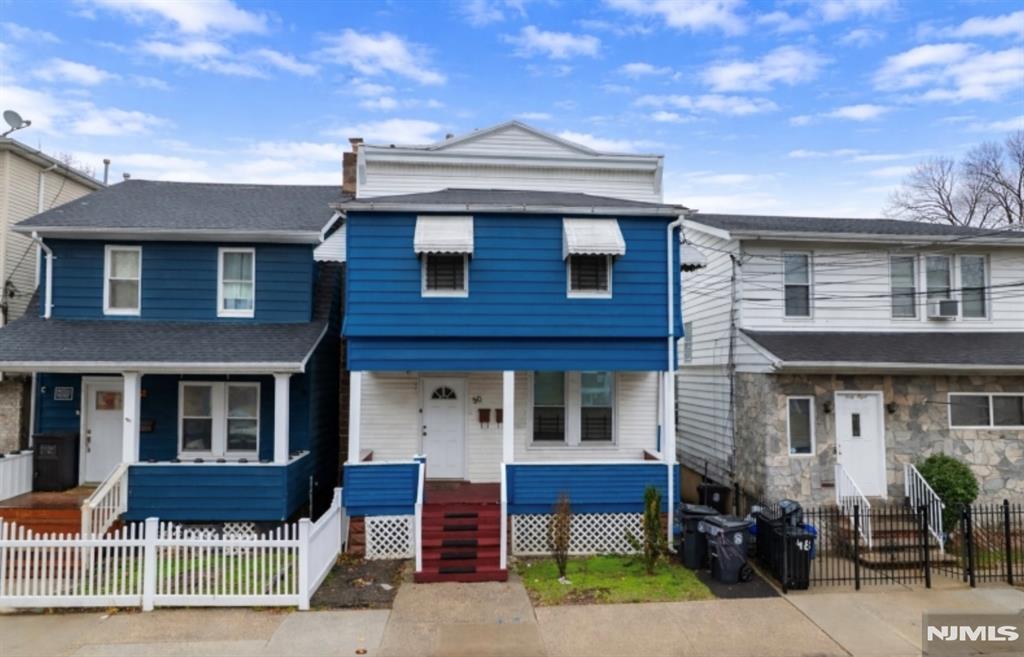 Welcome to 50 Palm Street in Newark, New Jersey, a well-maintained two-family home located in the desirable Lower Vailsburg section. This property offers a great opportunity for owner-occupants or investors looking for rental income in a convenient location.Each unit features 2 spacious bedrooms and 1 full bathroom, with updated interiors, spacious closets with organizers, and comfortable living spaces filled with natural light. The kitchens include stainless steel appliances, and the home is equipped with a Nest thermostat for modern energy-efficient climate control.The layout provides functional living areas and well-sized bedrooms, making each unit both comfortable and practical.Conveniently located close to major highways, public transportation, shopping, restaurants, parks, and universities, with easy access to I-78 and the Garden State Parkway, making commuting to NYC and surrounding areas simple.Whether you're looking to live in one unit and rent the other or add a solid property to your investment portfolio, this home offers great potential.