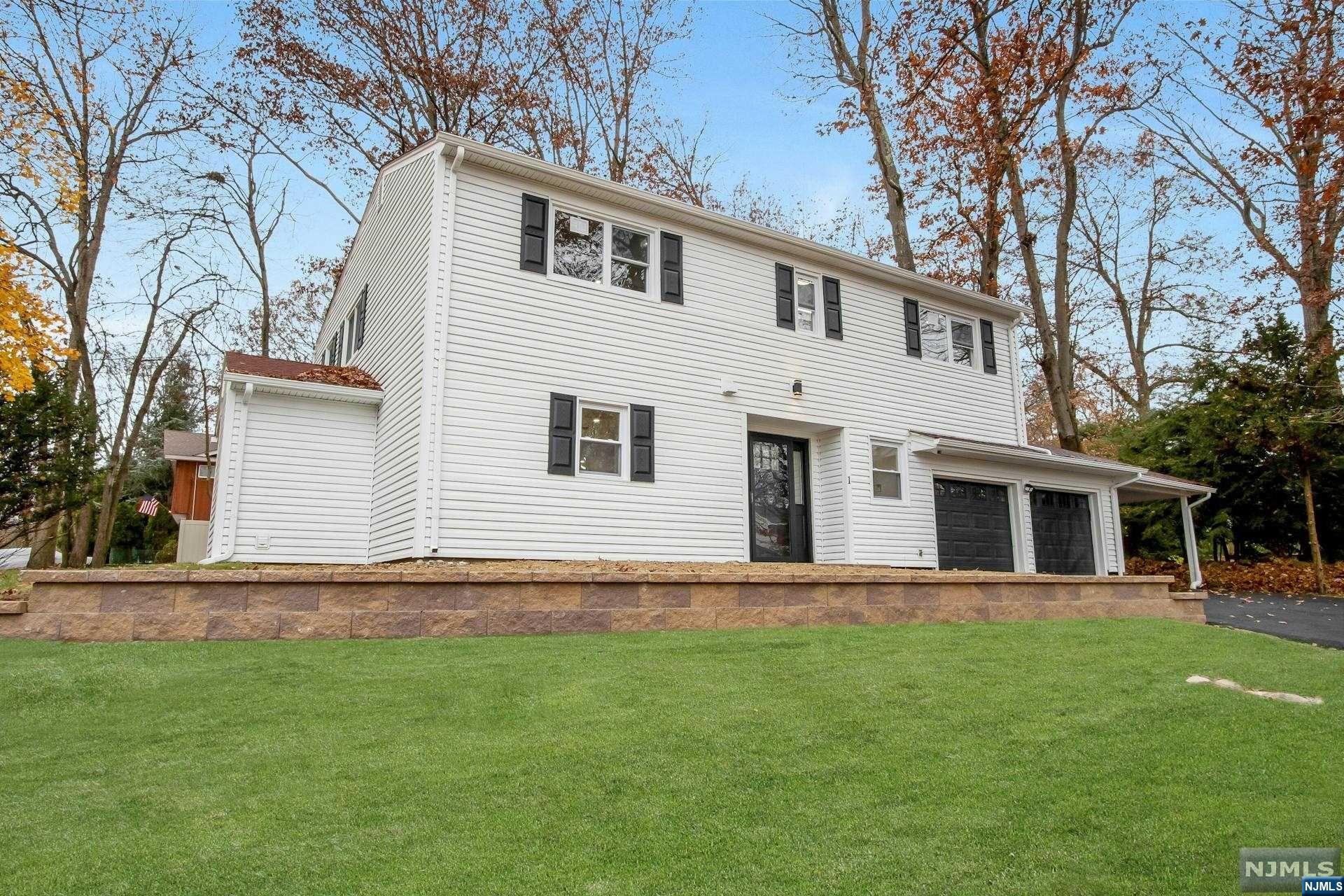 Luxuriously totally Renovated Colonial in Park Ridge with gleaming hardwood floors and an open floor plan! One of Park Ridge most sought after neighborhoods Expansive living room and dining room with sliding doors to the backyard. Immaculate kitchen featuring modern white cabinets, Quartz countertops, breakfast bar/peninsula and stainless appliances, and large pantry . A few stairs up you will find a large family room with a vaulted ceiling and a picture window with views of the backyard. The second level offers a luxurious primary suite including an oasis modern full bath. Three additional large bedrooms, a modern full bath and laundry hook-up. Finished lower level offers a spacious recreation room and storage. Lush property featuring a paver patio is great for entertaining! 2-car attached garage and carport completes this beautiful home! You absolutely will love living here!