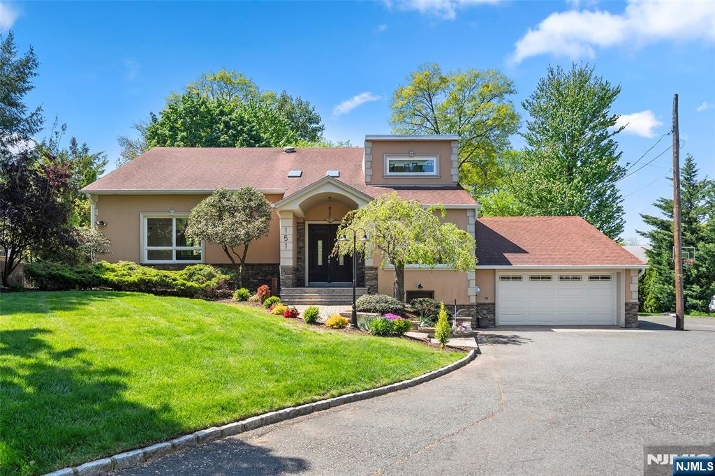 Tucked away in a peaceful, private setting on a long, quiet driveway, this property offers tranquility, privacy, and ownerâ€™s pride throughout. This 4 bed, 4 Full bath home is perfect for families, with one of the upstairs bedrooms spacious enough to comfortably accommodate two children with two bedsâ€”providing flexibility and room to grow. The modern kitchen, renovated approximately 5 years ago, blends style and functionality, while the basement features a full in-law suite complete with a kitchen area (ready for a stove and refrigerator), laundry hookups, a full bath, and an officeâ€”an ideal setup for multi-generational living. Meticulously maintained inside and out, the home showcases thoughtful care at every turn. The roof is less than 10 years old, and comfort is ensured year-round with individually controlled electric baseboard heating in every room, along with a heat pump and central AC, all under 5 years old. Outdoors, the property offers a park-like setting with mature trees and beautifully landscaped front and back yards, enhanced by a sprinkler system that keeps the grounds lush and vibrant throughout the seasons. And with a 5-minute walk to the bus stop and a 40-minute commute to Manhattan, youâ€™ll enjoy the perfect balance of serene suburban living and convenient city accessâ€”a truly wonderful place to raise your family. For a private tour, call or text Listing Realtor.Public Open House 7/11 Sat 12-2PM