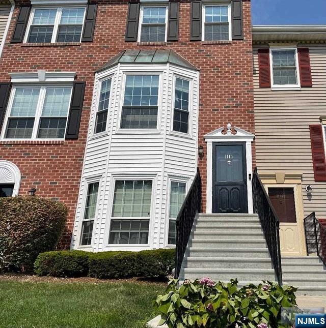 FULLY UPDATED TOWNHOME!!! Filled with natural light! High-end designer finishes & light fixtures throughout with exceptional style. Offers NEWER kitchen, dining area & hardwood floors. Living room with elegant wood burning fireplace, newly updated powder room & primary bathroom. Primary bedroom w/2 good sized closets & full bathroom. Also includes in unit NEWER washer & dryer, central air, security system and attic. Desirable private community clubhouse with heated in-ground pool, playground & tennis courts. Easy access to Bus/Train to NYC. One small conditional dog will be considered. Reserved Parking Space right out the front door. Tenant Insurance required. No Smoking inside the Townhouse. Landlord requires NTN credit report & background check. $100 application fee to condo board. Get in before the Pool opens! Tenant pays all utilities. Easy access to major highways, buses, Ramsey train Station, shopping and restaurants.