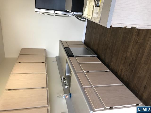 C13 - Bright STUDIO apartment available on 2nd floor of elevator building. Apartments over the stores at Washington Commons Shopping Plaza adjacent to StopNShop. Vinyl flooring. Galley kitchen with stainless steel appliances, dishwasher, frige and electric stove. Water is included in the rent, the Tenant pays the electricity. Bathroom with shower over a tub. Walk in Closet. Washer and Dryer in unit. Must carpet 80% of floor with substantial area rugs for noise. Onsite Parking. NO smoking of any kind, no pets. Perspective Tenant needs to earn 3x the monthly rent and have a 700 or better credit score. Must use Kent Realty application.