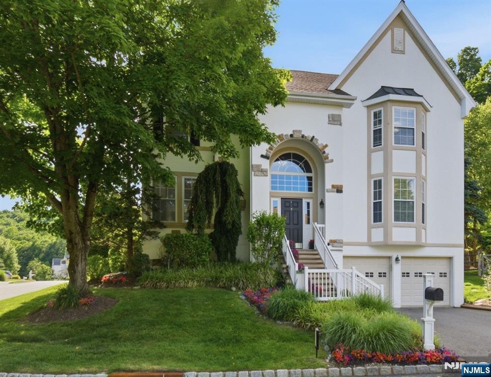 Welcome to 1 Rock Ledge, a beautifully maintained 5-bedroom, 3.5-bath colonial in sought-after Ramapo River Reserve. Features include hardwood floors, a two-story foyer, wood-burning and gas fireplaces, granite kitchen with GE stainless steel appliances, finished basement, and a private, storybook-like backyard retreat.