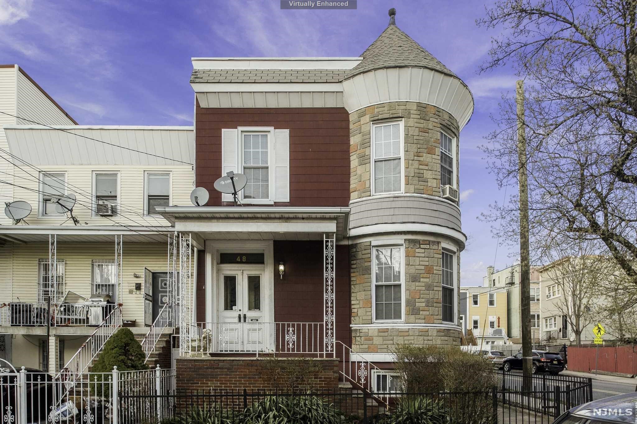 Great investment opportunity. First floor features 2 bedrooms, office, living room, kitchen and bathroom with access to a private backyard and parking spot. Second floor features, 3 bedrooms, family room, living room, kitchen, and bathroom. You can access walk out basement from the main level. Close to shops, dining, schools, and parks. Quick commute to NYC and minutes to Journal Square.