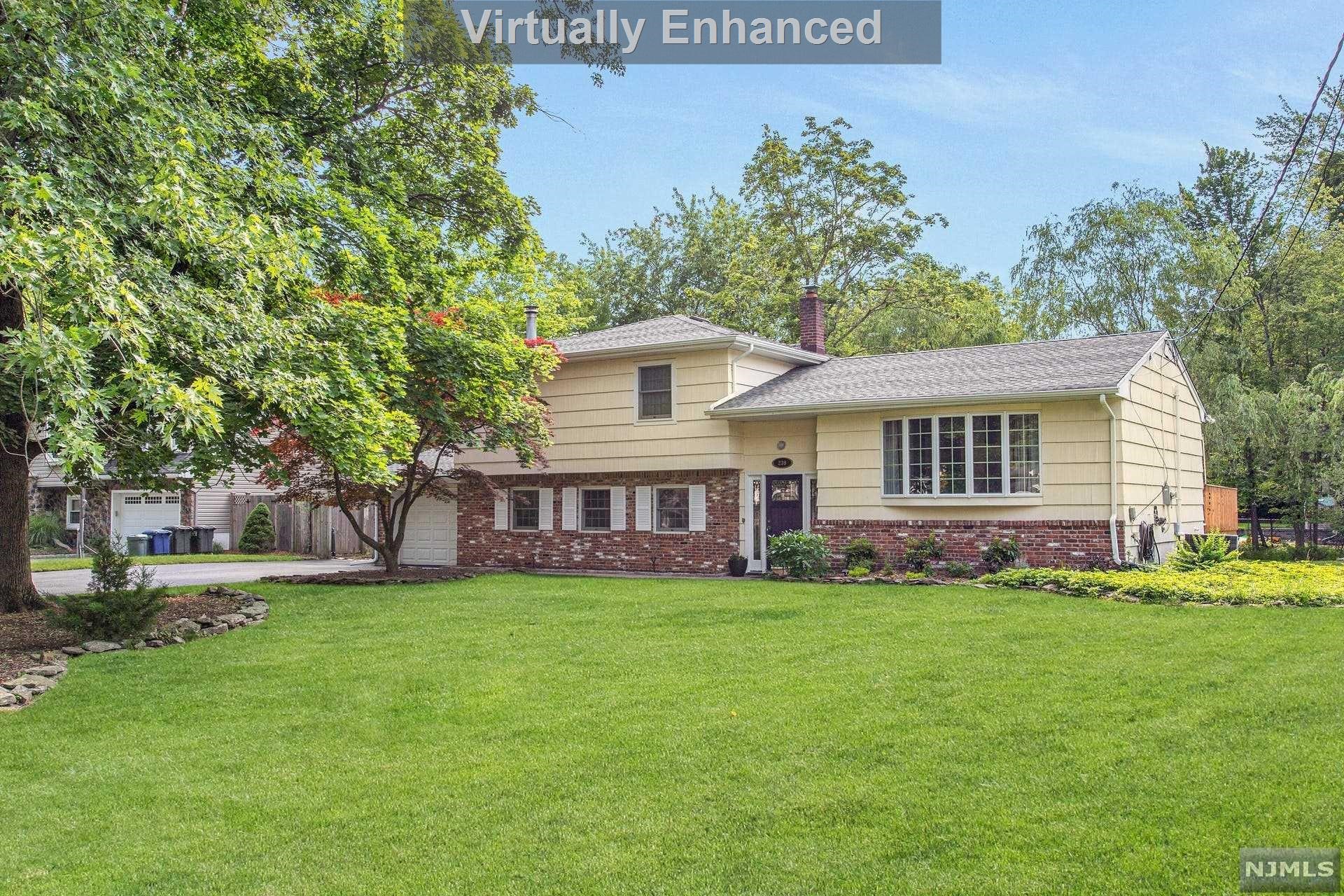 Welcome to this Classic Sugar Maple Split home overlooking a private & large flat rear yard w/beautiful brick patio & New 2-level deck for relaxed dining. The main level features an expansive living room, adjacent dining room w/glass french doors & skylight + kitchen that leads out to the upper deck & gas BBQ. The home's Bedroom Level has a spacious primary bedroom plus two additional roomy bedrooms & full updated bath. The entrance level has a full area of living space w/a large family room/fpl, full updated bath (SS), & a home office (4th BR) leading to the patio, deck, & immense rear yard. Gas heat, CAC & central Vac. Upgrades include 3 month old New Furnace & new roof, New driveway, CAC, updated Anderson front bay window, kitchen bay window & double hung windows, hardwood floors, recessed lighting & MORE! This remarkable home is located in a neighborhood of beautiful homes & offers an EZ NYC commute by car, bus & rail plus a fine restaurants! Exceptional Living!