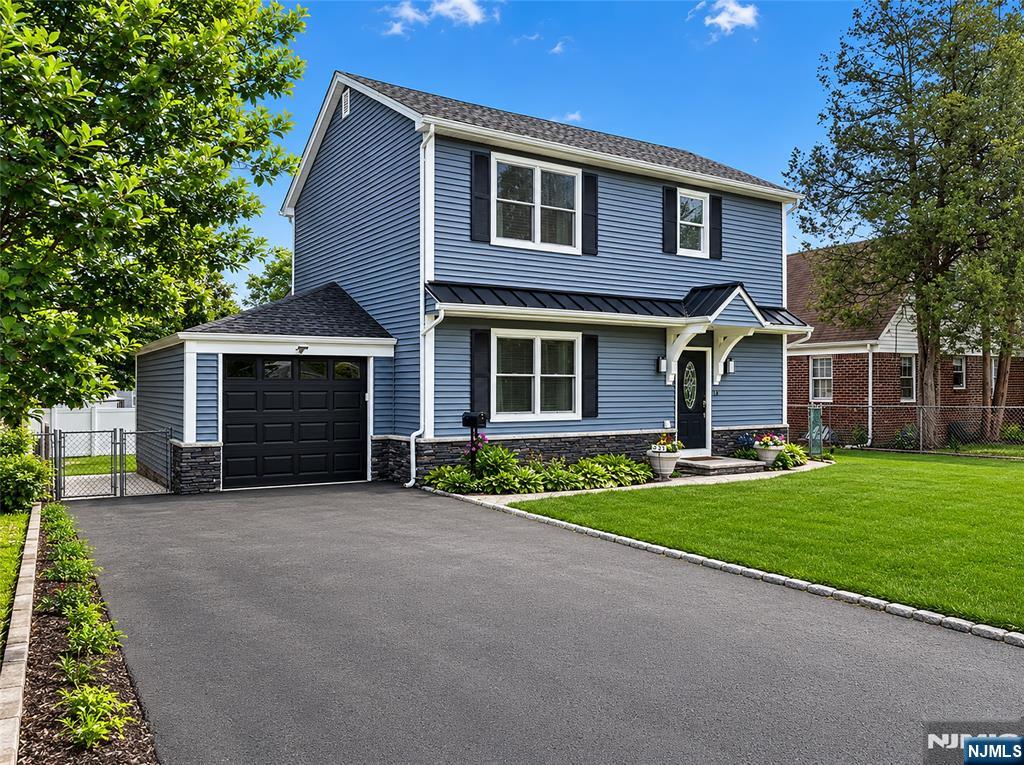 Welcome to this beautifully renovated 4-bedroom, 2.5-bath Colonial in one of Fair Lawn's most desirable neighborhoods. Completely renovated 7 years ago, this move-in ready home offers the perfect blend of timeless style, modern convenience, and a layout that's as functional as it is beautiful. The standout feature is the rare first-floor primary suite, offering privacy, convenience, and flexibility that is hard to find in Bergen County. Complete with a spacious walk-in closet and adjoining laundry area, it's a design that works for today's needs and tomorrow's possibilities. At the heart of the home is a stunning kitchen featuring high-end Café appliances, perfect for anyone who loves to cook, entertain, or simply appreciates elevated finishes. Upstairs, you'll find three additional bedrooms that can easily accommodate guests, home offices, fitness space, or hobbies. The finished basement takes this home to the next level with a dedicated theater room, creating the ultimate setting for movie nights, watching the big game, or hosting friends. Located just minutes from top-rated Fair Lawn schools, parks, shopping, dining, and convenient NYC transportation, this home offers the ideal balance of suburban living and commuter convenience. If you've been searching for a turnkey Fair Lawn home with a first-floor primary suite, luxury finishes, a finished basement, and an easy commute to Manhattan, this one checks all the boxes.