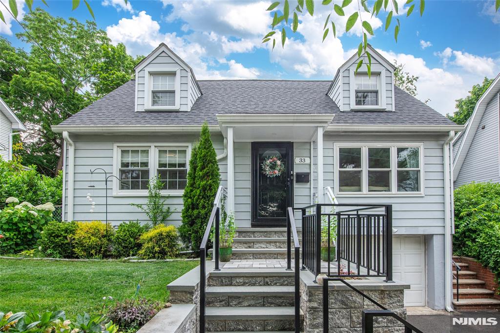 Delightful fully renovated 4-bedroom, 2-full bath Cape Cod w separate 3-season studio/gym/office outbuilding in the highly desirable Brookdale section of Bloomfield. A beautiful new stone retaining wall, bluestone front steps & brand-new aluminum hand railings create exceptional curb appeal & welcome you inside to a spacious living room featuring recessed lighting, bay windows & hardwood floors. The open eat-in kitchen with side entrance offers stainless steel appliances provides ample space for everyday living & entertaining. The 1st floor includes a full hall bath w tub/shower, linen closet & 2 bedrooms, 1 currently being used as a dining room. Upstairs you'll find a 2nd full bath & 2 additional spacious bedrooms w generous closet space. The newly finished basement features a rec room, laundry area, utilities, epoxy flooring & direct access to the attached garage. The level, private backyard offers a lawn, patio, shed & a fully renovated 3-season studio/gym/office, w a new roof, drywall, insulation, windows, doors, gutters, electrical outlets & lighting, providing a comfortable & versatile space for work, fitness, hobbies, or entertaining. Additional recent improvements include a new roof & all new windows & doors throughout (2022), updated HVAC system, including a new furnace & AC compressor for central air conditioning (2023) & new gutters (2024). Conveniently located near Brookdale Park, Glen Ridge Golf Course, NYC transport, Broad Street shopping/dining & more.