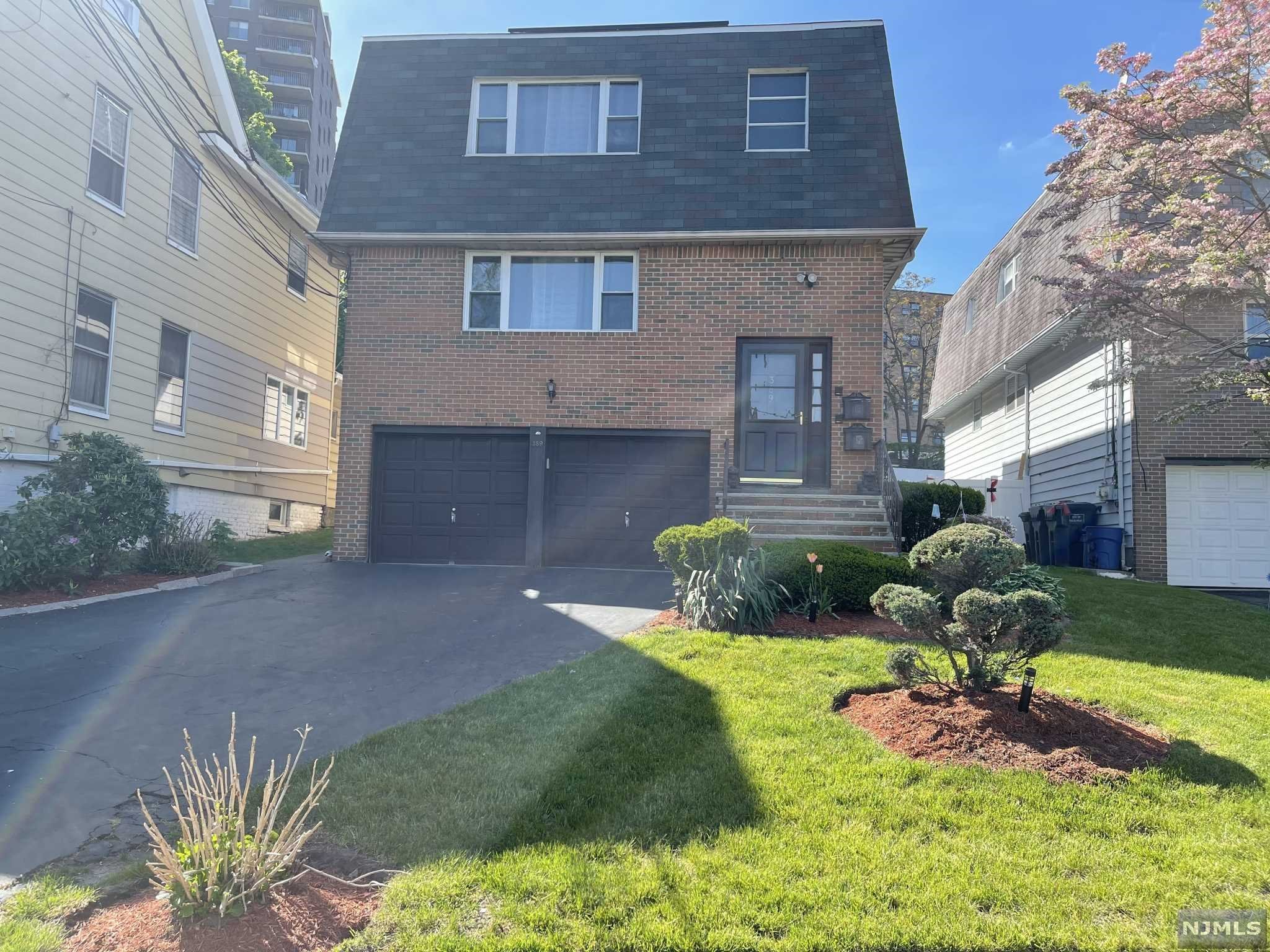 SPACIOUS TWO FAMILY HOME. 3 BEDROOMS, 1 1/2 BATHS, LR, DINING AREA AND WALK IN CLOSET IN EACH UNIT. 2 CAR GARAGE. FULLY FINISHED BASEMENT CAN BE BONUS ROOM, FAMILY ROOM OR PLAY ROOM AND HAS FULL BATH AND ITS OWN SEPARATE ENTRANCE. LAUNDRY IN BASEMENT FOR BOTH UNITS. THIS CAN BE AN AMAZING INVESTMENT OR OWNER OCCUPIED HOME. GREAT CURB APPEAL AND LOVELY LARGE BACKYARD. NYC EXPRESS BUS JUST A BLOCK AWAY, CLOSE TO HIGHWAYS, SHOPPING AND RESTUARANTS. DON'T MISS THIS AWESOME OPPORTUNITY!