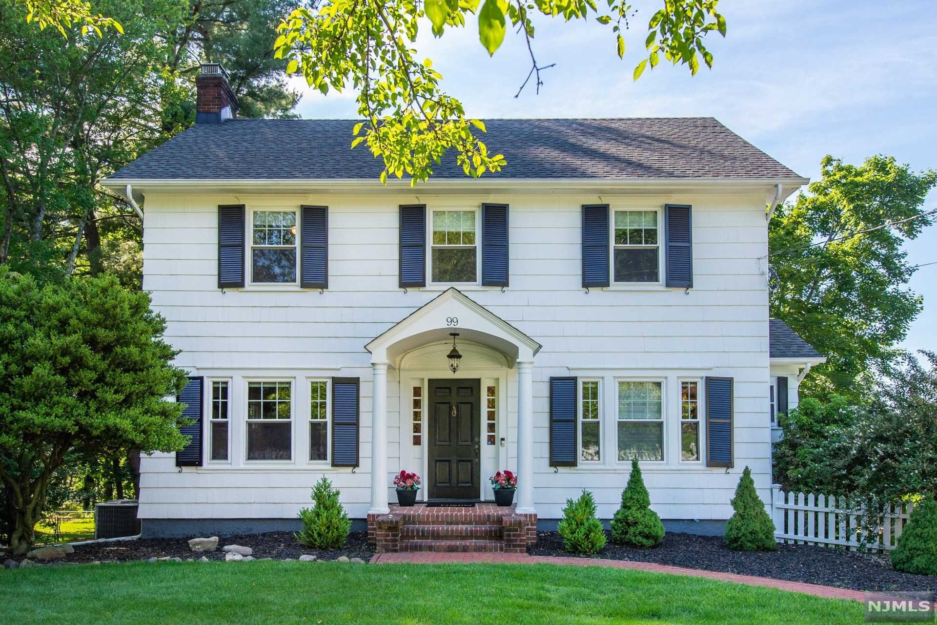 Welcome home to this beautiful center hall Colonial located in desirable North Caldwell! This house is the epitome of old-world charm meets modern-day living. The first floor boasts an open floorplan, including a welcoming foyer and a spacious living room for entertaining. The eat-in kitchen exudes modern elegance with a marble backsplash, white cabinetry and black detailing. Also on this floor is a dining space, bathroom, and FR with wall-to-wall windows overlooking the expansive backyard, perfect for a playroom or study. Upstairs are four bedrooms and one bathroom. The finished, walk-out basement completes the home including a recreation room, mudroom, laundry, and additional storage space. Updates include: new windows and custom blinds, central air, hot water heater, furnace, accent wallpaper, and a freshly painted exterior/white picket fence (2018 to 2021). The house is centrally located near all schools, recreational activities, and transportation to NYC.