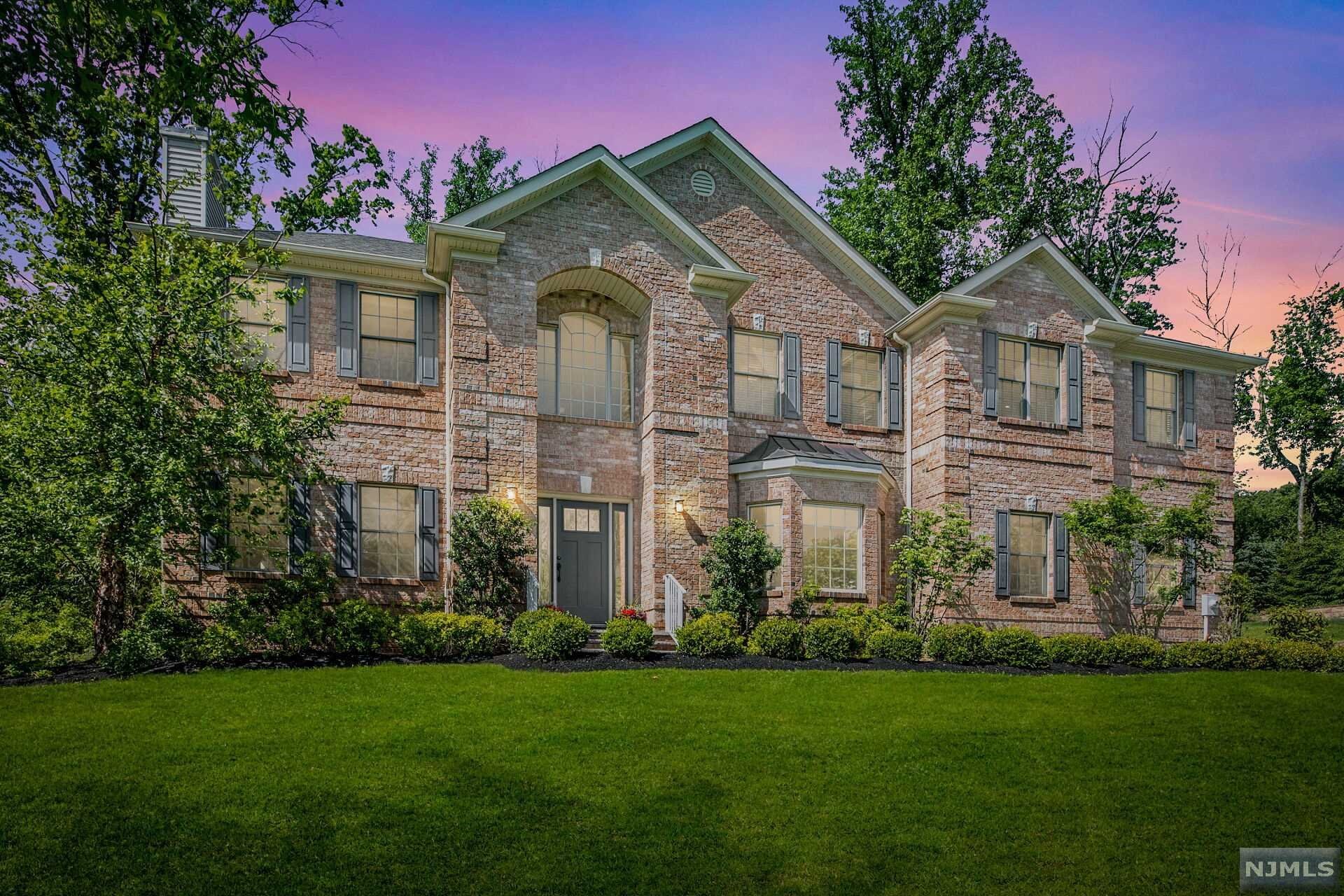 Captivating Custom Colonial built in 2014 is a MUST see! This quintessential home offers 5 bedrooms, 4 full baths and 1 half bath. Special features include magnificent high ceilings, two gas fireplaces, a master bedroom with two large walk-in closets, seating area, beautiful full bath with Jetted Tub, Stall Shower, Double Sink and a large finished basement. Commuters dream, West Orange Jitney stops at the door, providing shuttle service to the train station.