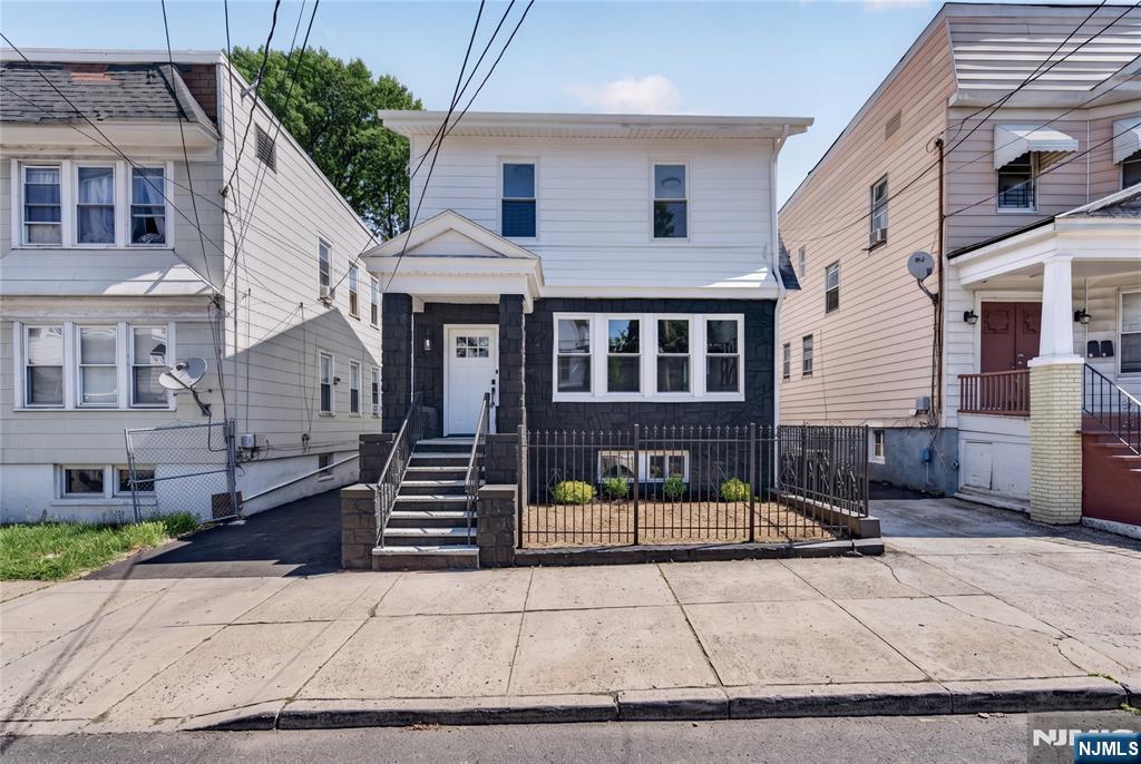 Fully renovated and move-in ready! This spacious home offers 5 bedrooms and 3 full bathrooms across 3 levels of living space. The first floor features a bright living room, formal dining room, eat-in kitchen, and 1 full bathroom. The second floor offers 4 generously sized bedrooms and additional full bathrooms. The third floor includes an additional bedroom, perfect for guests, a home office, or flex space. Full unfinished basement with endless potential. Detached 3-car garage plus 4-5 additional parking spaces. Conveniently located near shopping, schools, parks, and transportation. A must-see property with plenty of room for everyone!