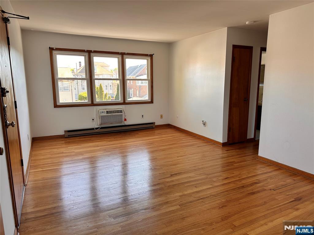Well-maintained 1-bedroom apartment in a beautifully kept 8-family brick building 2nd floor walk-up. The unit features hardwood floors throughout, a spacious living room, an eat-in kitchen, full bathroom, and a private balcony. Included is one off-street parking space, plus laundry hookups in the basement with additional storage. Tenants also enjoy shared use of the yard. Ideally located with easy access to NJ Transit bus or rail to NYC and major highways, including Route 17, Route 3, the Garden State Parkway, and the NJ Turnpike.