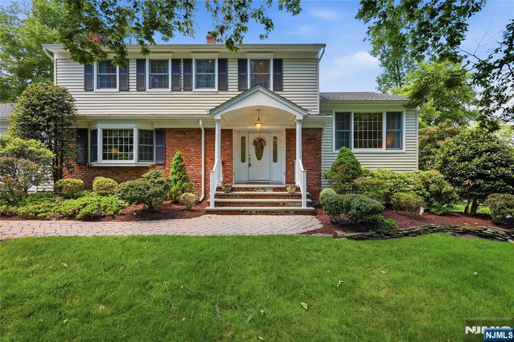 This well-cared for Colonial home in Berkeley Heights is offered for the first time in 40 years! Ideally situated at the center of cul-de-sac, a newly paved driveway welcomes you inside to an elegant entry foyer featuring a walk-in coat closet, and draws you immediately to the bright front-to-back formal living room with large picture windows. A banquet-sized formal dining room leads to the modern, eat-in kitchen with upgraded appliances that opens to a composite deck and private rear yard. Youâ€™ll also enjoy the cozy family room featuring a wood-burning fireplace. Four bedrooms complete the upstairs, including a primary bedroom with walk-in closet and full bath, a main hallway bath, and linen closet. Downstairs thereâ€™s new wall-to-wall carpeting in the lower level bedroom/office, and recreation room. Located in the sought-after Kensignton Woods neighborhood and just minutes from NYC Direct transit, an outstanding downtown, parks, recreation and excellent schools, this is one home youâ€™ll enjoy for years to come.