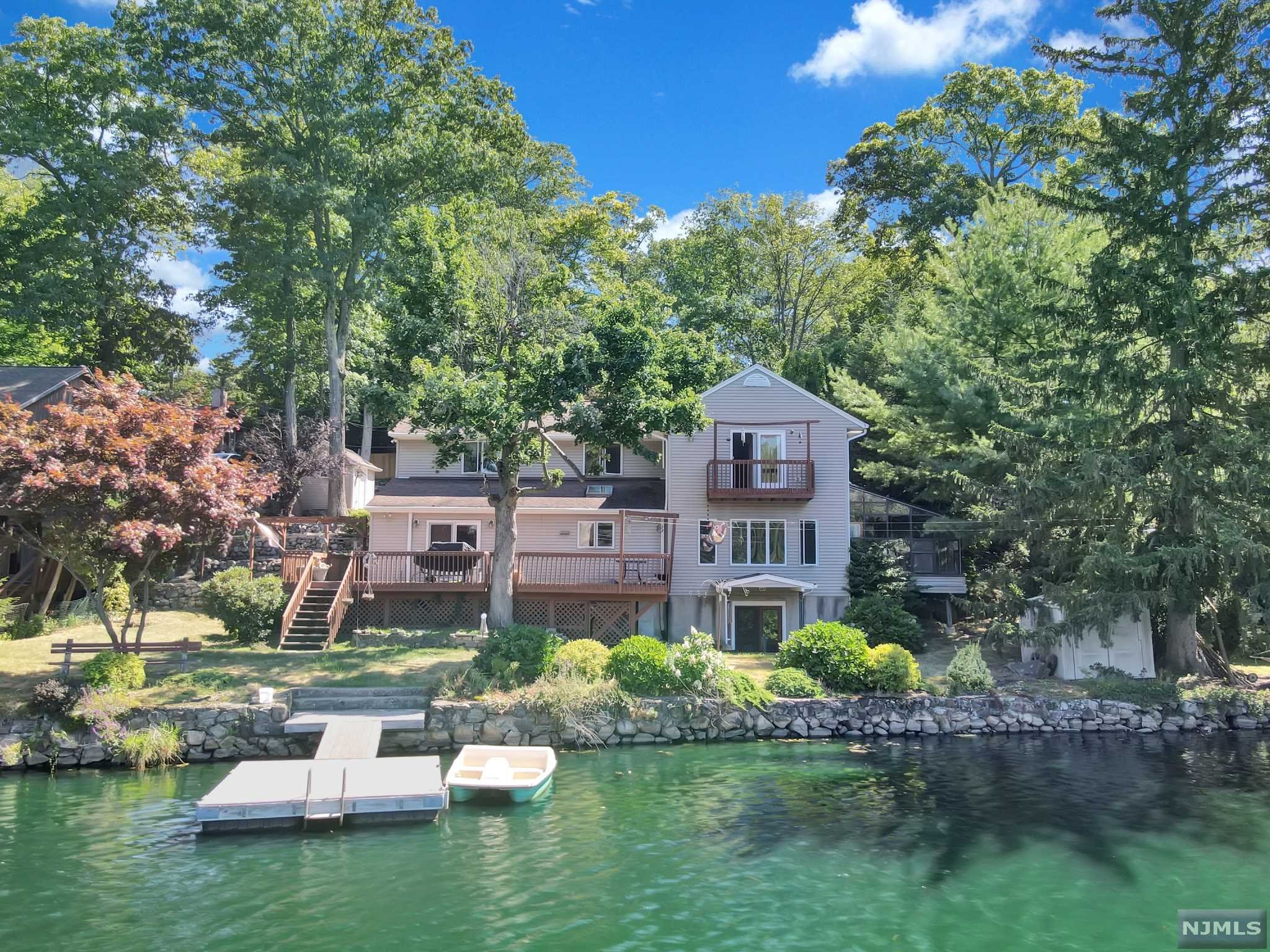 Welcome to this Spacious Lake House in Desirable Lindy Lake Community! 5 Bedrooms, 2.5 Bath! Master Bedroom has it's Own Balcony Over Looking the Lake!! Large Kitchen with Granite Countertops and Separate Dining Area! Large Family Room on Lower Level with Wood Burning Stove, and Greenhouse! Unfinished Basement with Walk-Out to Back Yard! Plenty of Room for Entertaining on the Back Deck! Private Lake Community Offers Beach, Clubhouse and Activities for All Ages! Just 1 Hour to NYC and Close to Major Highways, Shopping, Dining, Golf Courses, and So Much More!
