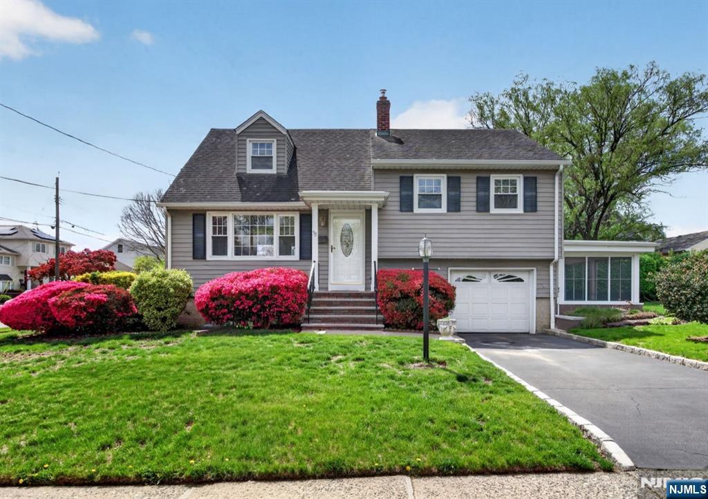 Welcome to this charming split-level home, perfectly positioned on a corner lot in the highly sought-after Patricia Place neighborhood of Clifton, New Jersey. This well-maintained residence features 3 bedrooms and 1.5 bathrooms, a sun-filled living room with a large picture window, dining room, and a functional kitchen. The finished basement provides versatile additional living space, complemented by an attached garage, enclosed porch, central air conditioning, and a beautiful side yard ideal for relaxing or entertaining. Conveniently located near public transportation, houses of worship, shopping, and parks, this home offers both comfort and accessibility. Come make this lovely house, your home!