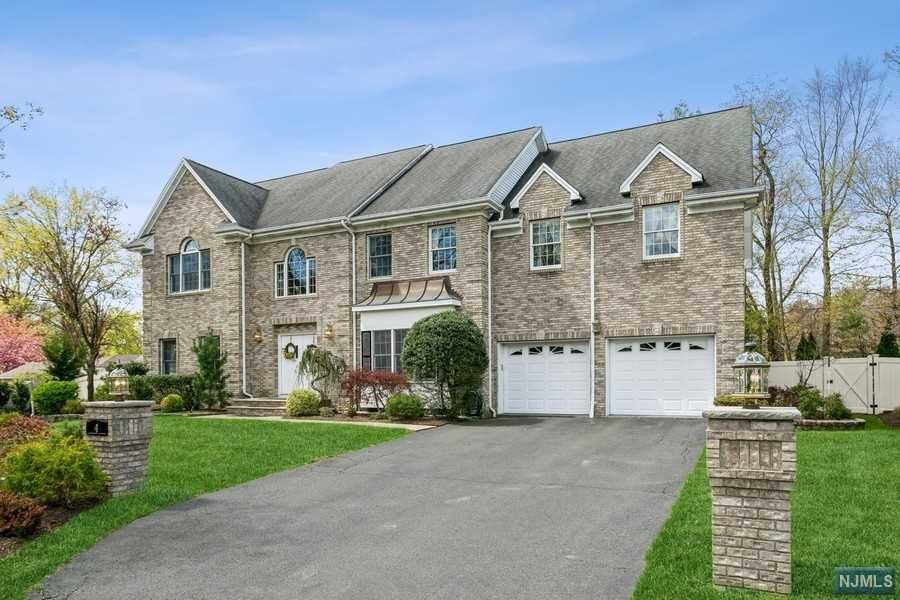 Exceptional 4 Bdrm, 3.5 Bath Col at the end of a Cul de Sac w Wonderful curb appeal. Sun filled 2 Story EF w granite floors welcomes you.Gleaming Hardwood floors, Moldings, stunning details t/o .Elegant FDR w bay window and inlay flrs, Inviting FLR opens to 2 Story Great Rm with soaring stone fireplace, o/e to the yard. This open flow is perfect for entertaining. Opens to the amazing MEIK with white cabinetry, granite countertops & Center Island, SS appliances new dishwasher, 2 pantries, eat in area with skylight and o/e to the deck . .5Bth, Laundry Rm , access to 4 car dream garage ( 2 tandems). 2nd Floor: Opens to the Great Rm. Primary Suite with 2 WIC, plus Lux Prim Bth with marble countertop and flooring , jetted tub and shower. 3 Bdrms and Fbth complete this level. Basement: Lge Rec Room, Gym area ,Full Bath, storage and utilities. Fenced in Backyard offering you a peaceful oasis. Close to Blue Ribbon Schls & NYC trans. NEW HTWT HEATER .H&B DUE 5/5 BY 7PM
