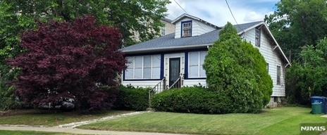 Ideal for investors, contractors, or buyers looking to customize a home to their own style, this 2-bedroom Colonial presents an exceptional opportunity to build equity while creating value in an established Bergen County neighborhood. Situated on an approximately 50' x 124' lot in Hackensack's R-3B Zone, where two-family dwellings are a permitted use, subject to buyer verification and municipal requirements, the property features a living room, dining room, enclosed porch, hardwood floors, detached garage, and partial window updates. The home is in need of significant renovation and repairs, offering outstanding potential for rehabilitation, possible expansion, or conversion to a permitted two-family dwelling, subject to buyer verification and municipal approvals. Due to the property's condition, buyers should consult with their lender regarding available financing options. Property is being sold strictly as-is. Seller will not make any repairs or provide any credits. Conveniently located near shopping, dining, parks, public transportation, and major commuter routes. First showings begin at the Open House on Thursday, July 16, 2026, from 4:00 PM to 6:00 PM. Private showings are available by appointment through the listing agent. DO NOT WALK THE PROPERTY WITHOUT AN APPOINTMENT. Large dogs on premises.