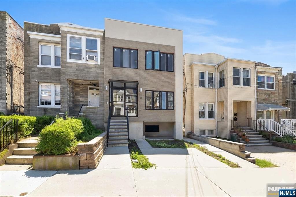 This renovated six bedrooms five bathroom two family home in the heart of JC Heights is officially on the market for $1,299,000 and ready for its next owner. This expansive property features three distinct levels of versatile living space. The second floor offers bright and sunny living spaces with a massive living and dining area, a modern kitchen with high end appliances, a dedicated laundry room, two full bathrooms, and three bedrooms including a spacious master suite with a walk in closet. The main level mirrors this impressive layout featuring another three bedrooms, two full bathrooms, its own kitchen, a separate laundry room, and a welcoming foyer entrance. The flexible lower level includes a massive fully tiled basement area measuring over seventeen by fifty four feet with its own full bath and direct walk out access to a private backyard perfect for outdoor dining and entertaining. Perfect for commuters, this prime location offers effortless access to New York City via nearby public transit options including the bus and light rail. Text Hitoshi at 718-413-3171 with all questions.