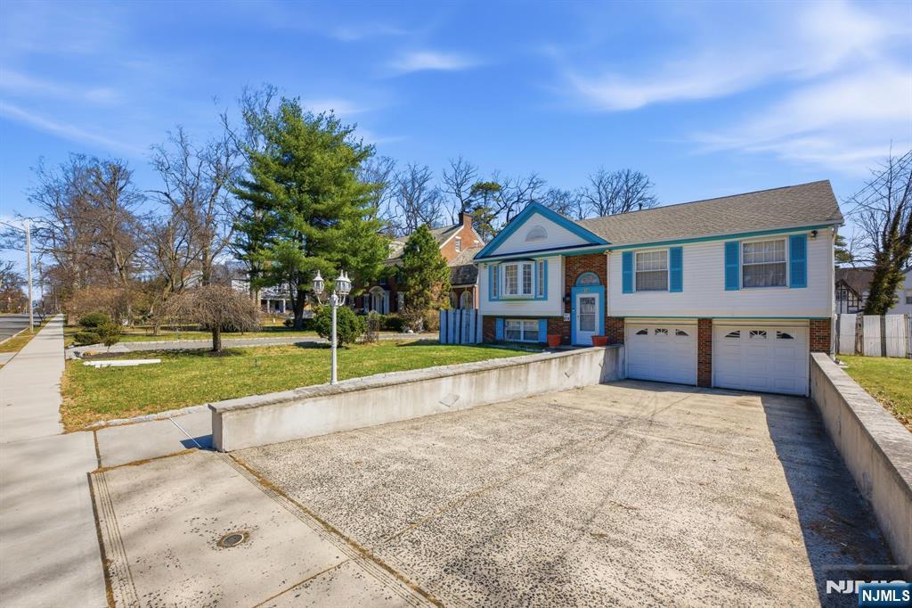 Nestled between Heywood avenue and Tremont avenue, 674 Berkeley avenue is a quintessential Ranch house that boast a classic Bay window and a combination of red brick and vinyl sidings. Pull in the driveway and access the two cars garage adjacent to the ground level which houses a family room/ game room, laundry room and full bathroom. The dining room leads to the overside deck great for outdoor entertainments and cookouts. The property features a formal dining room, living room, three bedrooms and three full bathrooms. This Seven Oaks gem enjoys a close proximity to NJ Transit trains, major highways and parks
