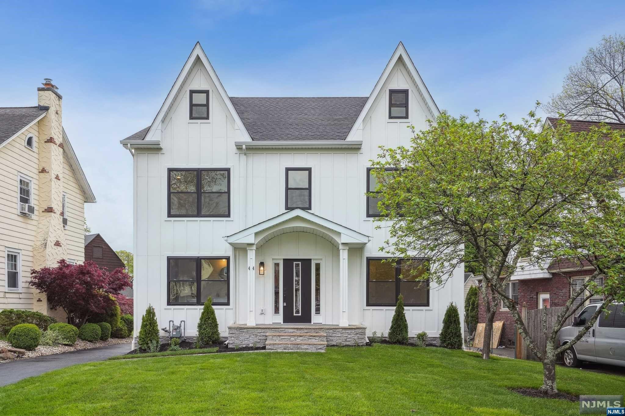 Stunning custom-built 5 bedrooms, 4 full bathrooms and 1 half bathroom colonial in the best location of the best town! The first floor of this home boasts a spacious open floor plan, a 1st-floor bedroom, one full bath, a family room with electric fireplace, and a formal dining room, The kitchen is complete with high-end Jennair appliances, a center island, quartz counters, and custom cabinets. The 2nd floor is home to two bedrooms, a laundry room, and a luxurious master suite with a walk-in closet. The 3rd floor has one bedroom, one full bath, and a sitting room. The basement is fully finished with a rec room and a half bath. All built-in closets throughout the house. Walking distance to schools and train station to NY CITY! Must see!!!