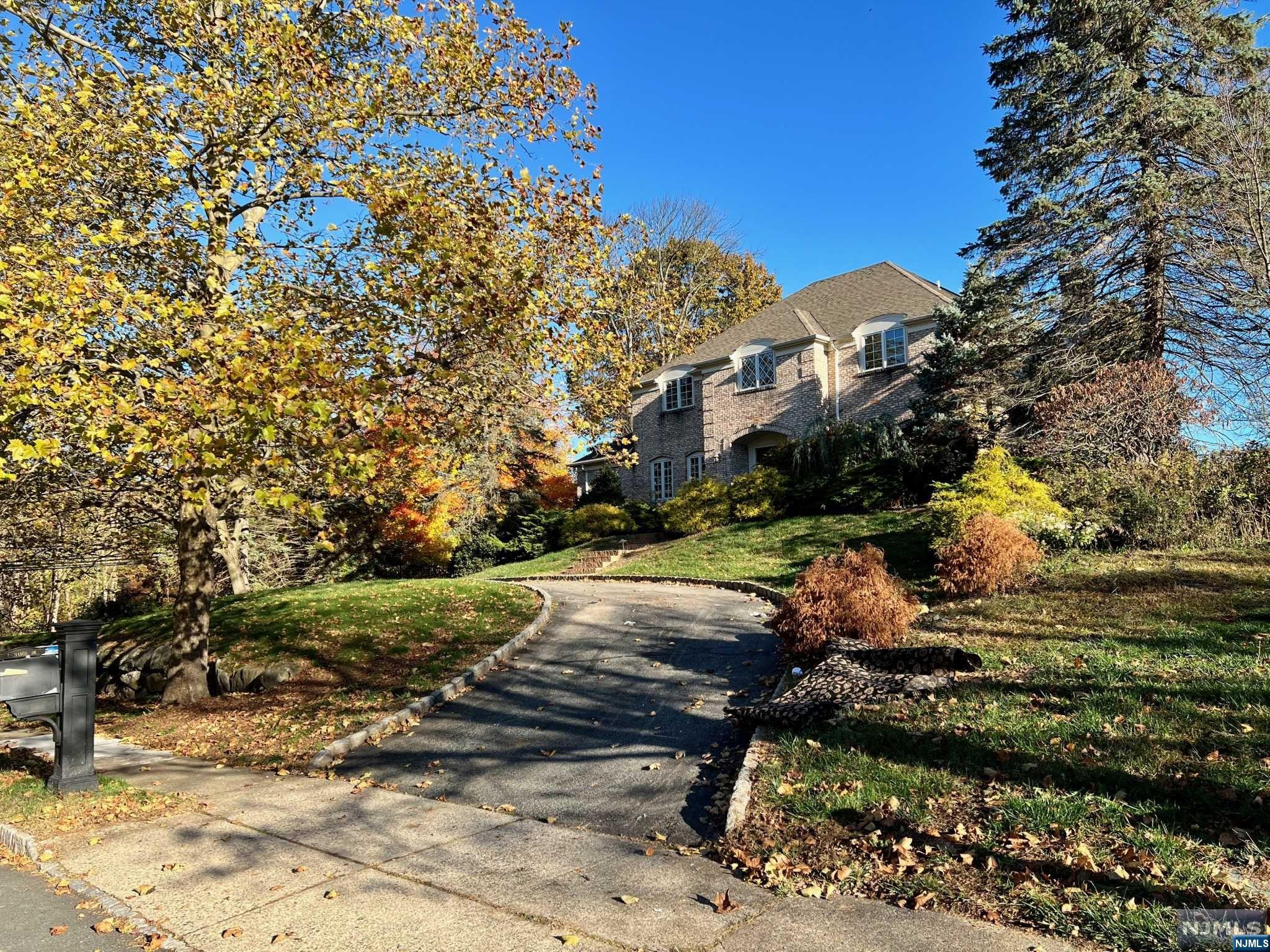 Welcome to this extraordinary opportunity! Up for sale is this classic center hall colonial which happens to be located in one of the areas premier and most desired neighborhoods. You walk into a majestic entrance foyer and greeted by hardwood floors throughout with a welcoming open floor plan. Recessed lighting in kitchen and family room. Kitchen has a center island and granite tops. It haves five bedrooms with one being on the first floor and a full bath near by. Family room has a wood burning fire place and a walk-out to an extended synthetic deck which overlooks a wonderful private fenced in yard protected by mature trees. Master bedroom suite has walk-in closets and generous size bath jetted tub and skylights. A full finished basement is a huge bonus. Couldn't ask for better location as this is ideally located to numerous major highways, shopping amenities galore and downtown Morristown is minutes away. This home does needs some TLC and your efforts will make this a winner.