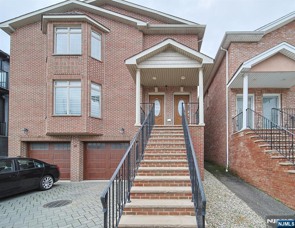 Welcome to this young brick home, ideally situated in the heart of Palisades Park, NJ. This spacious and sunlit residence features an open-concept layout with hardwood floors throughout, recessed lights, and a large kitchen complete with granite countertops and a low-maintenance backsplash. The house offers generously sized bedrooms, including a master suite with its own private balcony and a full en-suite bath. The fully finished basement boasts a spacious living area with a kitchenette, plus two additional large bedrooms. Conveniently located near transportation, shopping, dining, and major highways. Donâ€™t miss this incredible rental opportunity.