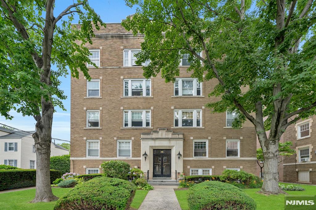 Timeless pre-war charm meets modern-day convenience in this rarely available, one-level condo on the 4th floor of Park Center Community. Exceptional corner residence has 2 bedrooms, 1 bath, and offers approximately 1,053 sq. ft. of beautifully preserved space with character and architectural details. Sun-filled southern exposures highlight the home's oversized windows, original hardwood floors, high ceilings, classic moldings, wainscoting, and chair rails. Updated kitchen features premium stainless steel appliances, including Bosch dishwasher, Fisher & Paykel refrigerator and GE gas range. Unit was freshly painted and equipped with custom radiator covers in 2026.This unit comes with an assigned storage unit and 1 car garage #11. Ideally situated on a picturesque tree-lined street, just moments from Bloomfield Avenue's vibrant dining, shopping, and cultural scene, with Montclair and Glen Ridge nearby. Enjoy easy access to direct NJ Transit trains and buses to NYC, and major highways. Perfect for first-time buyers, downsizers, or those seeking a stylish pied-a-terre. Community amenities include: pet-friendly, elevator building, on-site laundry, assigned storage unit and garage parking spot #11 ($65/mo.). A backyard gazebo provides a charming outdoor common area for all residents. A rare opportunity in the heart of Bloomfield!