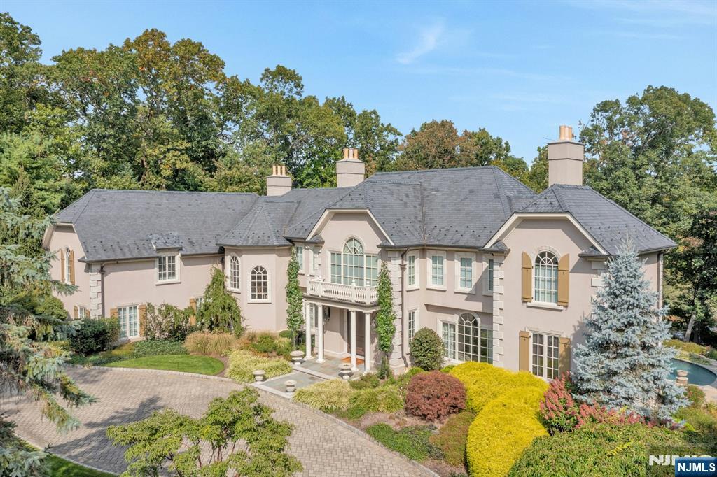 Spectacular cul de sac setting for this 5 bedroom,6.2 bath center hall colonial. Inground pool/spa, Baker's Pond views, firepit and multi level terraces. Primary suite with sitting room and large bath are/fireplace, 3 ensuite bedrooms, first floor guest br/bath, large rooms throughout highlighted by a gourmet kitchen/fpl, FDR,Fr/fpl, private office/fireplace and much more. Wine cellar highlights the finished basement with summer kitchen, gym, outside entrance. So much more!