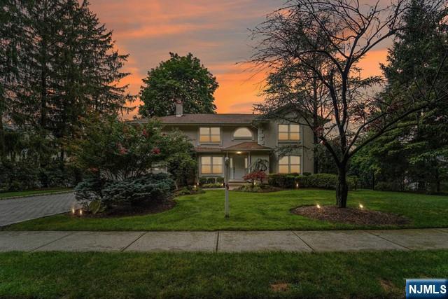 At the top of Closter, on the alternative side of Alpine lies a 15,246 sq ft(approx) of land with 3,213 sq ft(approx) home. This Cntr Hall Col boasts 4 beds, 3.5 baths, pool, and twin decks. Inside, sunlight pours through expansive windows, illuminating rooms with a natural glow. A gas fireplace graces the capacious living room. The gourmet kitchen hosts a premier Sub-Zero fridge. The sizable dining and living rooms offer access to dual decks, overlooking the lush yard with a tropical pool. Upstairs reveals 4 bedrooms, some en-suite, and a central bath. Laundry convenience near the primary bedroom is complemented by attic storage. Closter's renowned schools provide comfort in your child's education. The close locale ensures easy school access, fostering a family-friendly ambiance. The distinguished Northern Valley Regional High School at Demarest boasts a Blue Ribbon School Award from the US Department of Education. By bus or car, 30 minutes from NY!