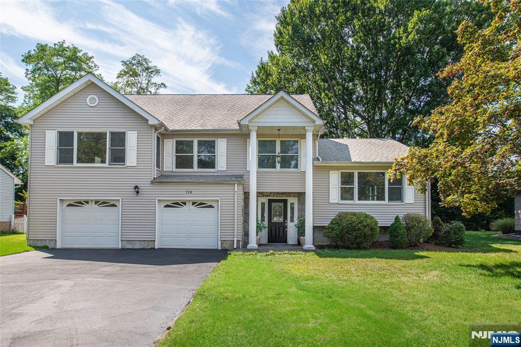 You will immediately feel at home the second you enter this stunning 4 BR/2.5 BTH home nestled in the heart of Glen Rock, one of Bergen Countyâ€™s most desirable communities. Inside, generously sized rooms, hardwood floors, custom millwork, built-ins, & natural stone flooring provide a beautiful layout. The main level features a spacious Living Room/Dining Room ideal for entertaining, an Eat-in Kitchen, sun-filled Great Room with fireplace, Sunroom, Powder Room, & Laundry Room. Upstairs, the Primary Suite offers a W.I.C. & ensuite bath, while 3 additional Bedrooms & a Full Bath complete the second floor. The partially finished Basement provides flexible space for recreation, fitness, media, or a home office. Outside, the multi-tiered deck overlooks a private, beautifully landscaped backyard with room for outdoor entertaining & enjoyment. Premier location close to top-rated schools, parks, dining, shopping, & NYC transportation.