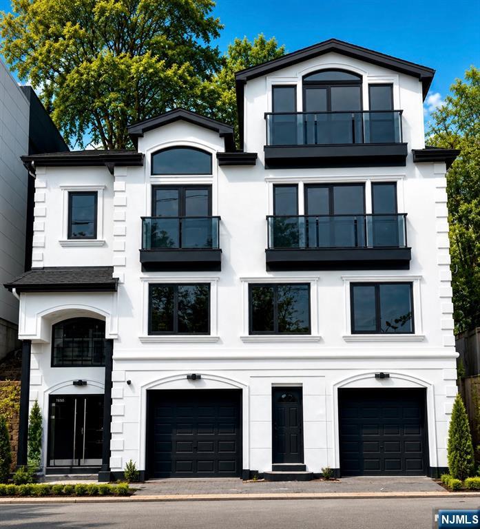 Perched in one of Edgewaterâ€™s most coveted enclaves, this luxurious single-family multi level residence offers sweeping, picture-perfect views of the George Washington Bridge and the shimmering Hudson River. Every inch of this home reflects meticulous craftsmanship, refined style, and effortless comfort. The property highlights are as follows: Sun drenched rooms with elegant finishes. Second floor features Open-concept living â€” A seamless blend of living room, dining area, and gourmet kitchen, office and half bath. Third floor has a spacious primary en-suite sanctuary, 3 additional bedrooms and 2 fall baths. Top floor offers another kitchen, half bath and large family room overlooking NYC and private deck in rear. This home blends luxury, convenience, and iconic views into a rare offering. Whether youâ€™re enjoying sunrise over the Hudson, hosting gatherings in beautifully appointed spaces, or commuting with ease, this residence elevates every moment.