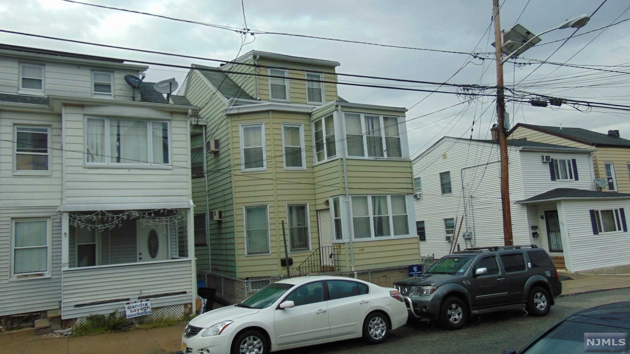 Great investment Property. First floor features 2 bedrooms, EIK, Living room and full bath. 2nd floor is identical but also has full finished Attic with large bedroom studio apartment and full bath. Full walk out basement with all separate utilities and somewhat newer boiler and HWT. 1 Boiler, 1 Hot water tank . This is a great investment opportunity.