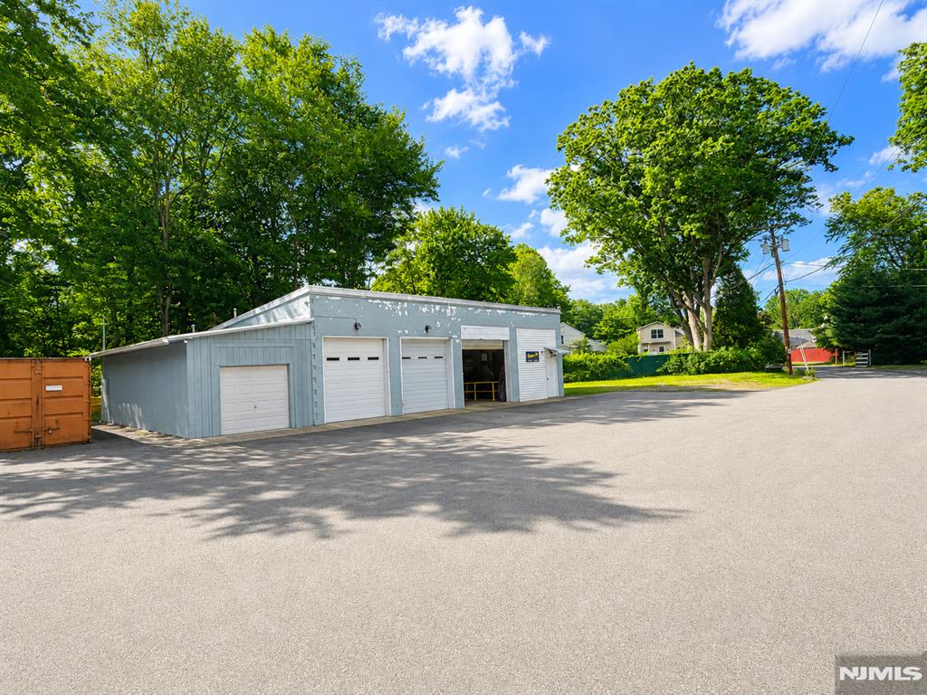 Approximately 2,700 square feet of functional commercial space available in the heart of Haskell. Currently occupied by a mechanic, this property is well suited for contractors, fabrication shops, service businesses, light industrial users, warehouse operations, and other approved commercial uses. The building features three oversized bay doors, a dedicated office area, and a half bath, providing an efficient layout for a wide range of business operations. Excellent access and ample workspace and parking make this an ideal location for companies seeking a practical and versatile commercial facility. Easy access to routes 287, 208, and 23.