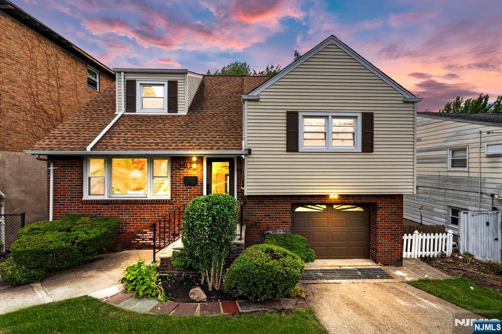 Beautifully updated and move-in ready, this exceptional home combines modern design, flexible living, and an unbeatable Palisades Park location just 5 miles from the George Washington Bridge, offering outstanding access to New York City. From the moment you step inside, sun-filled spaces, hardwood floors, and an open-concept layout create a warm, inviting atmosphere for everyday living and entertaining. The beautifully appointed kitchen features natural wood cabinetry, quartz countertops, premium finishes, and generous workspace. The spacious primary suite offers a private spa-like bathroom, while two additional bedrooms and a second beautifully updated full bath provide comfort and privacy for family and guests. The fully finished walkout lower level with high ceilings and direct backyard access offers exceptional flexibility for recreation, a home office, guests, or an in-law suite. A bright sunroom, attached garage, driveway parking, new mini-split heating and cooling systems, updated electrical and plumbing, fresh landscaping, and a spacious backyard complete this thoughtfully improved home. Just moments from Broad Avenue's restaurants, cafés, shopping, parks, and NJ Transit, you'll enjoy the perfect balance of neighborhood charm and everyday convenience. Modern finishes, versatile living spaces, and an exceptional location come together to create the perfect place to unpack, settle in, and enjoy this vibrant community.