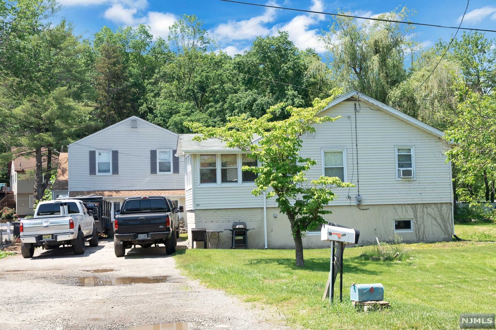 Don't miss out this rare opportunity to own this two spacious houses on one lot! Live one house and collect the rent or rent both houses out with great return. The rear one is newly completely renovated four bedrooms two full baths colonial house. The front one is three bedroom one bath ranch house with full basement with laundry hookup with great potential. Plenty of storage and closets space. Separate water, gas and electricity meters and tenants pays all utilities. Located on a very quite dead end street close to highway, shopping and public transportation. Seller has NJ Realtor License.