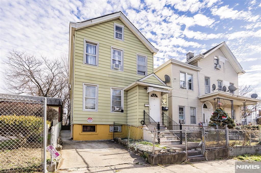 Great opportunity for investors or first time buyers. This conveniently located 4 bedroom, 3 bath home features a finished basement and 1 parking spot. Close to shopping, transportation and local amenities. Property sold as is, no repairs or credits. Equipped with solar panels offering potential energy savings.