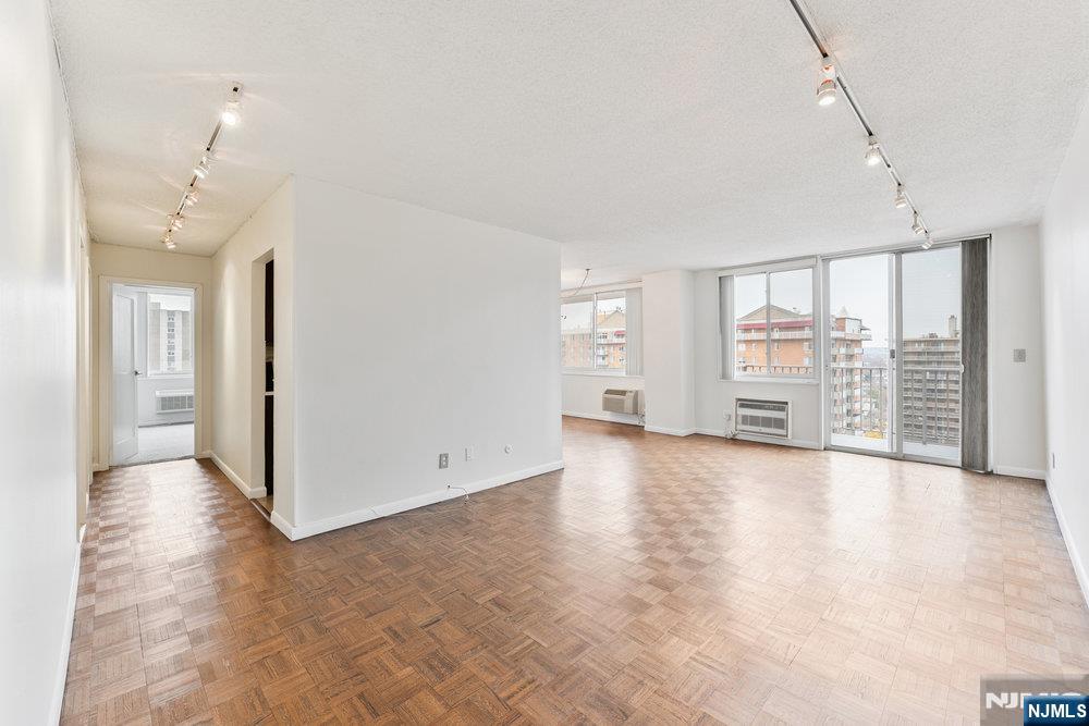 Perched on the 20th floor of The Devonshireâ€”Hackensackâ€™s tallest luxury towerâ€”#20D is a bright southwest-corner 1-bed, 1-bath (937 sq ft) that delivers the NYC skyline right to your bedroom window every single day. Wake up to unobstructed Manhattan views then step onto your private balcony for sweeping sunsets over Hackensack. Freshly painted, updated kitchen with quartz counters + stainless appliancesâ€”this chic condo is completely move-in ready for December. Only 6 units per floor = peace, privacy, and true high-rise serenity in a full-service building youâ€™ll love posting: 24/7 doorman Newly renovated gym + resident lounge Outdoor pool Assigned garage parking Close to NYC express bus, minutes to Whole Foods, Trader Joeâ€™s, Riverside Square Mall, and every highway. Just 15 min to the GWB. (937 sq ft | 1 Bed | 1 Bath | Garage | Immediate Occupancy)