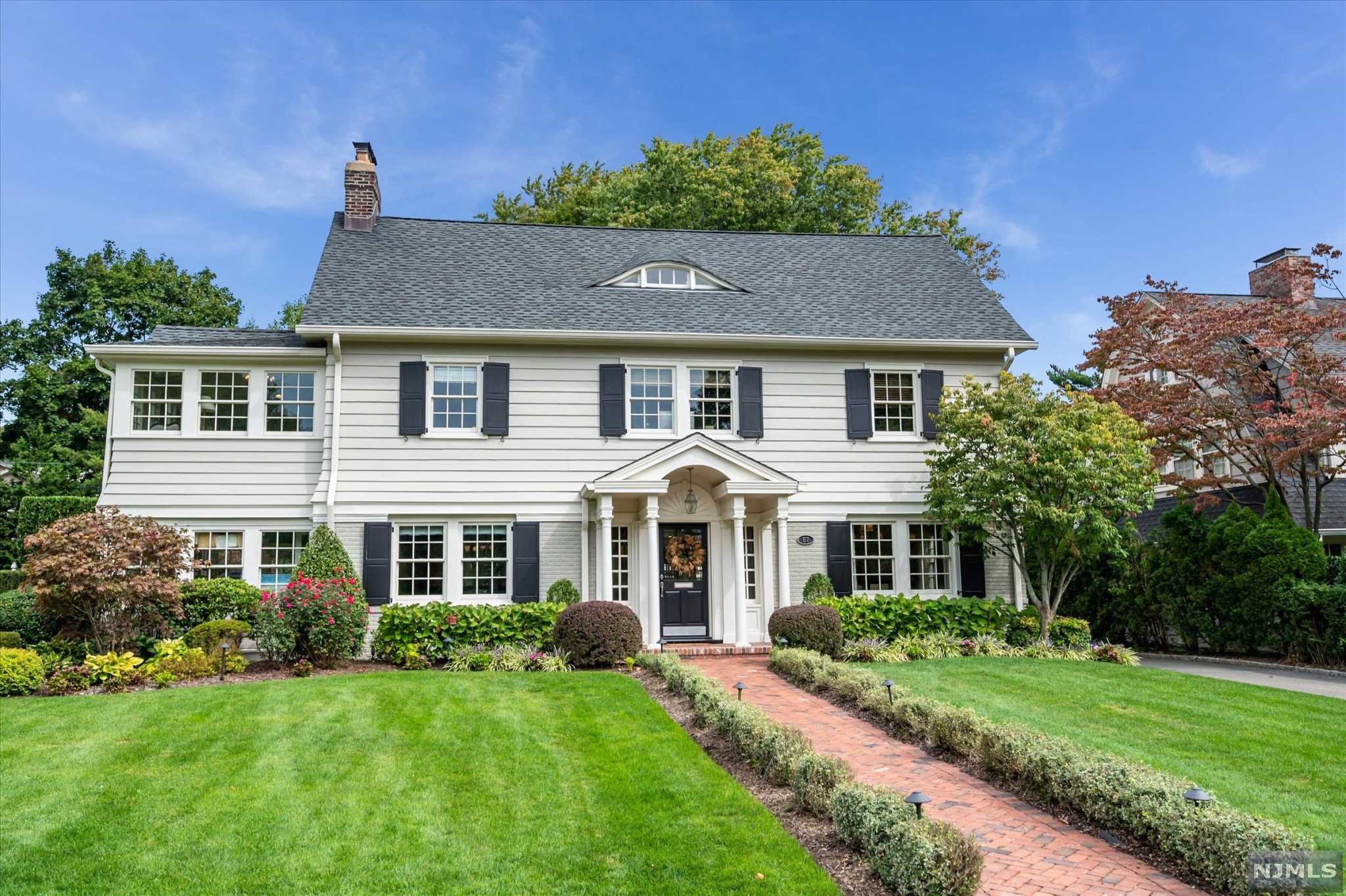 Understated luxury married with warmth & comfort best describes this classic colonial built by high-end builder. No detail overlooked in this stunning home. Open kitchen with Danby countertops, custom cabinetry, 6-burner Viking stove & double ovens, 2 dishwashers, wine fridge, prep sink in mahogany island with seating for 6! Cozy separate dining area with coffered ceilings open to light-filled family room with French doors out to paver patio & private level yard. Mudroom with custom cabinetry, LR w/fireplace & custom built-ins & lovely window seat. Newer windows throughout, multi-zone cooling/heating, beautiful hdwd floors. 2nd fl features 5 bedrooms including 1 with ensuite & primary suite with sitting room, 2 closets & oversized bathroom. 3rd floor has bedroom, bath, and den. So close to Walnut St. train & village. jitney to GR train at the corner. Close to top-rated schools! 4,328 sq ft as per tax record. Photos represent home prior to current owners possession.