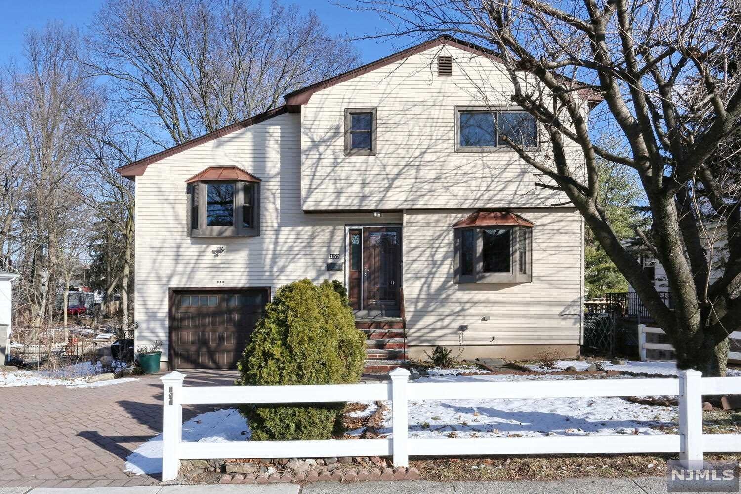 Lovingly maintained split level shows true pride of ownership. Truly a large home over 1800 sq ft. Entry foyer opens to family room, large kitchen with breakfast nook and half bath. Off the kitchen is an entertainment sized formal dining room. Huge formal living room! Enjoy the finished basement which features a fully tiled floor and full bath. Also access to enclosed paver patio. Master bedroom with dual entry full bathroom and two more good sized bedrooms! Many updates throughout including, new roof, new windows, new exterior doors. Paver driveway and walkways. A must see to appreciate this well kept home!